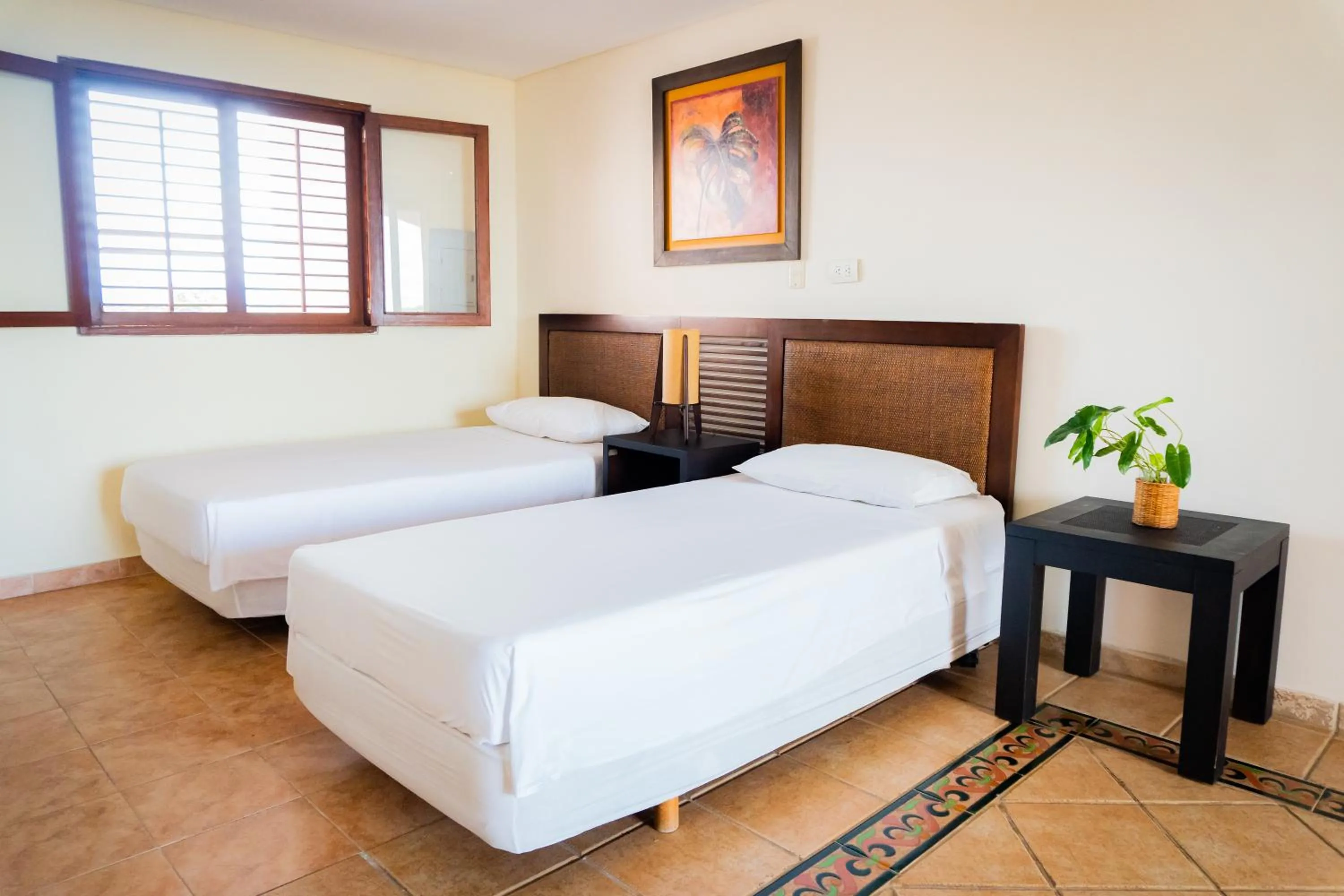 Bed in Hotel Peñon Suites