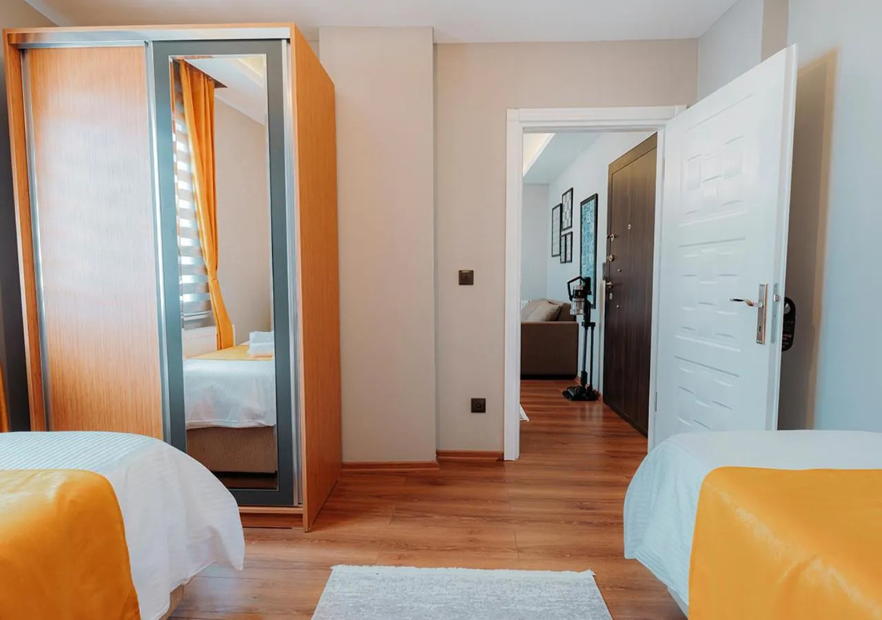 Bed in Umut Apartments