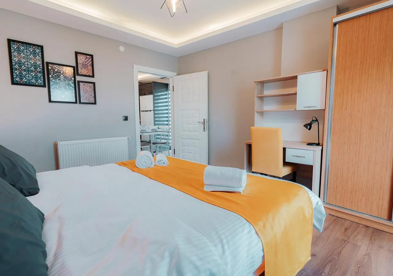 Bed in Umut Apartments