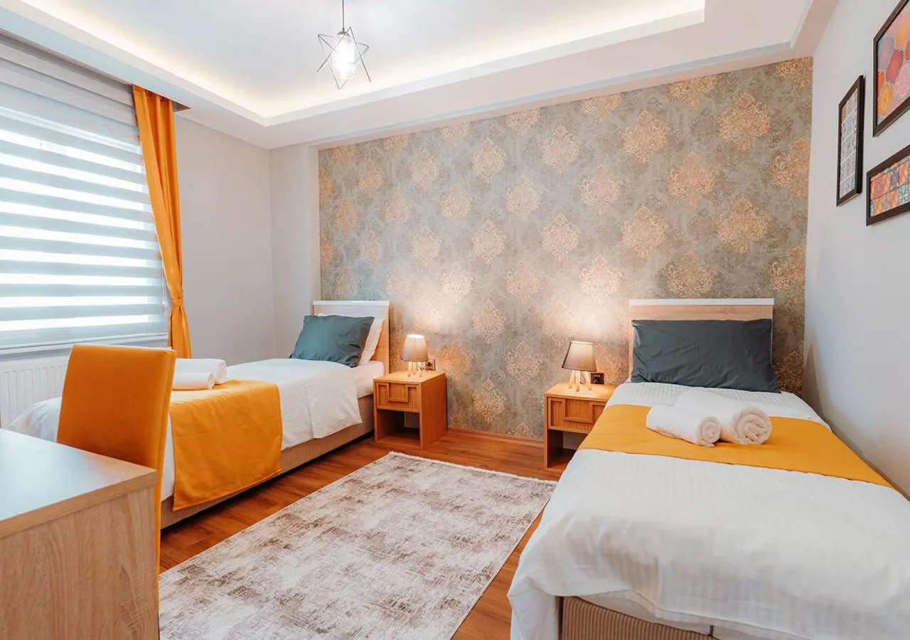 Bed in Umut Apartments