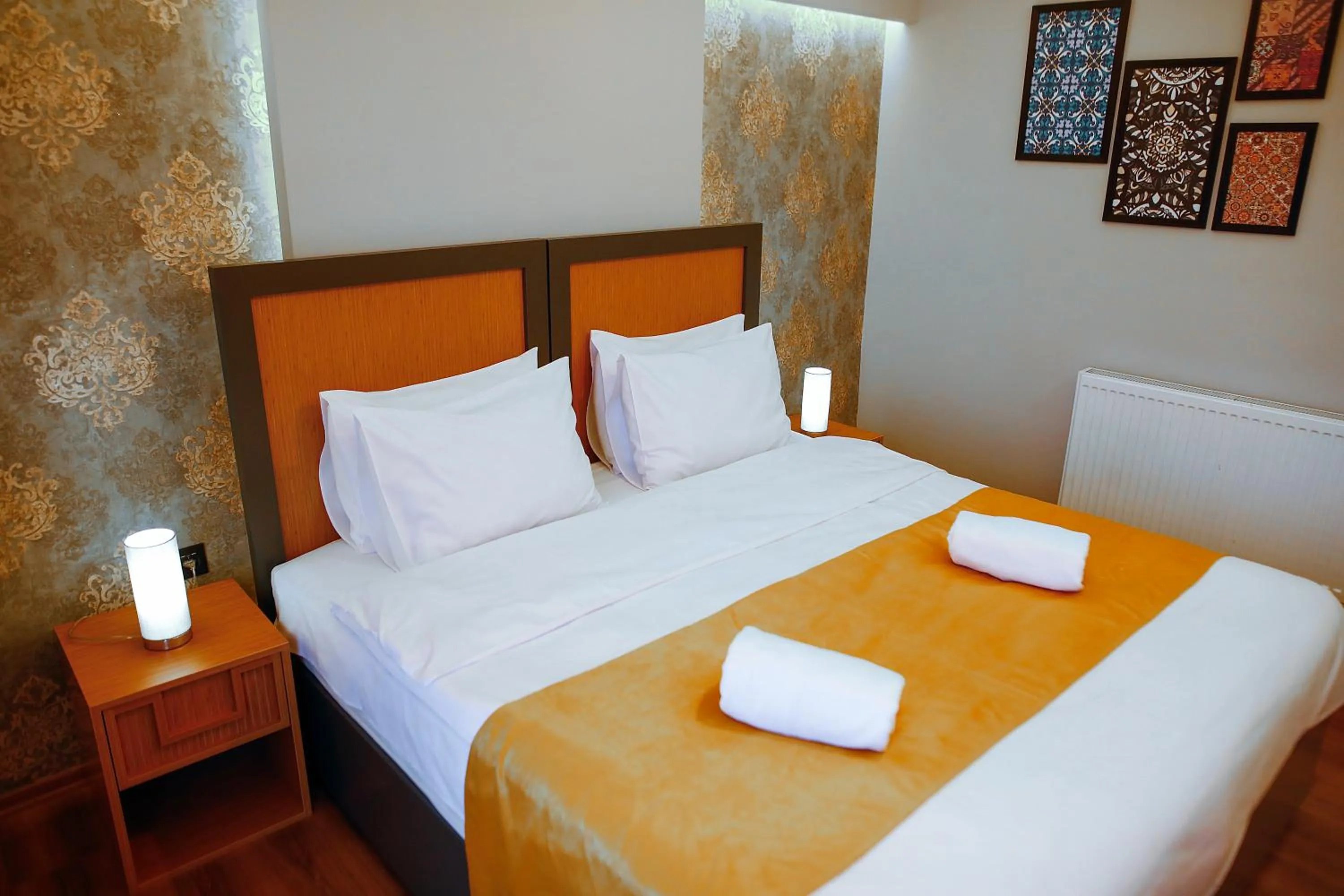 Bed in Umut Apartments