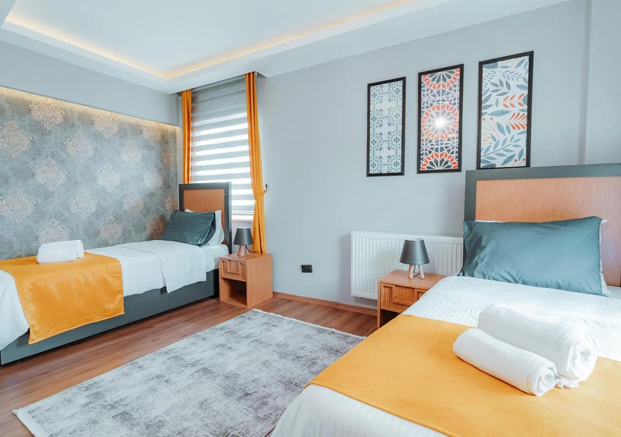 Bed in Umut Apartments