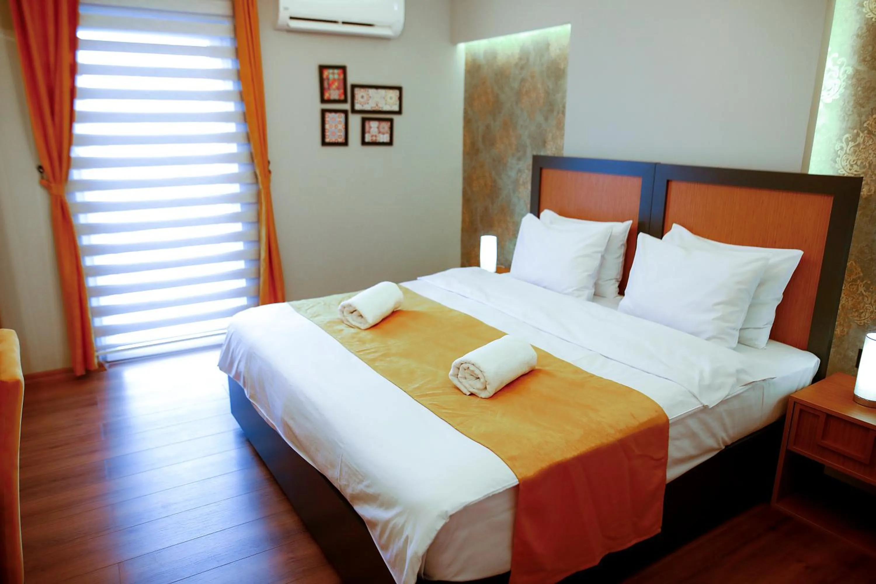 Bed in Umut Apartments