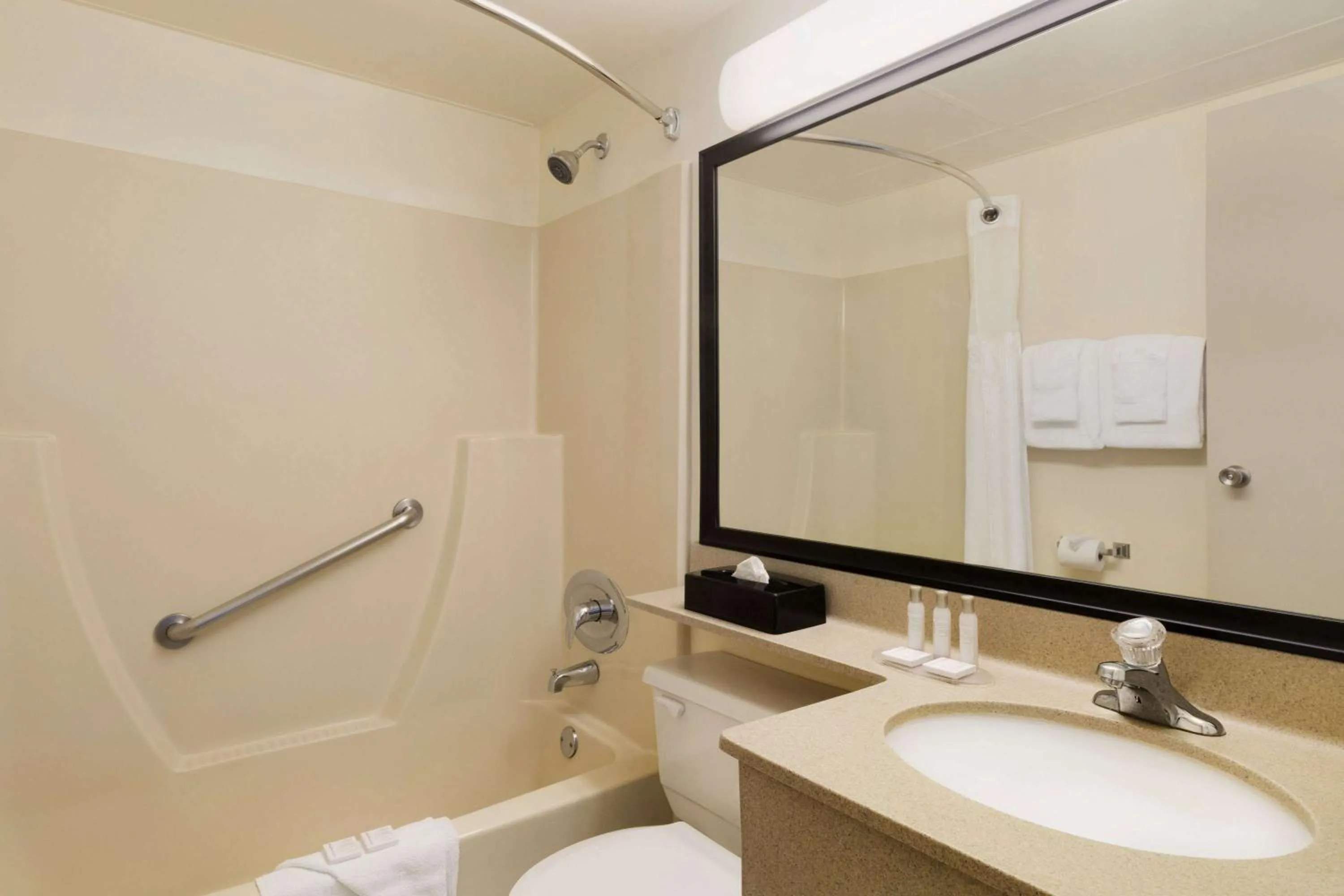 Bathroom in Travelodge by Wyndham Edmonton South