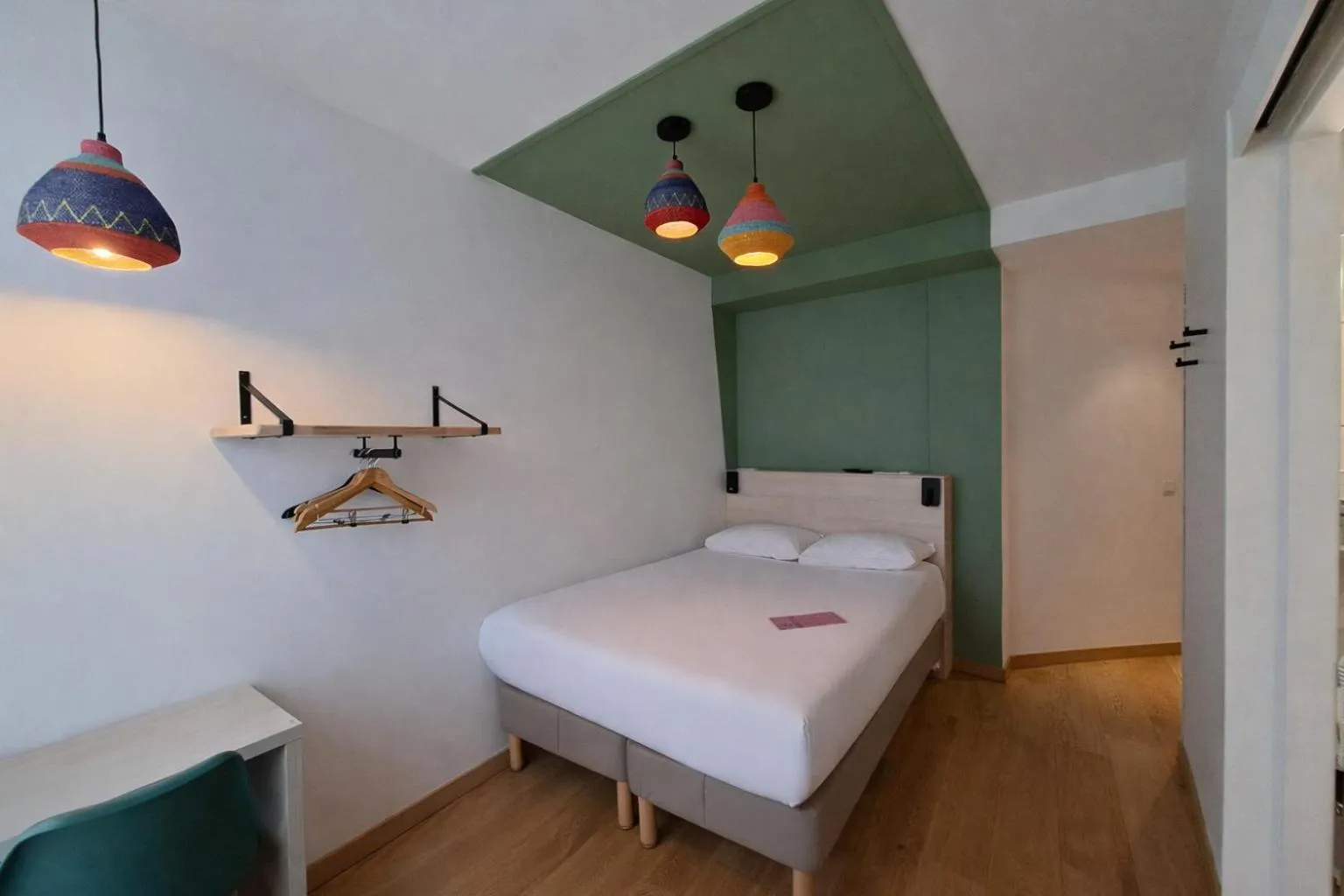 Bed in HOTEL AMBASSADEUR