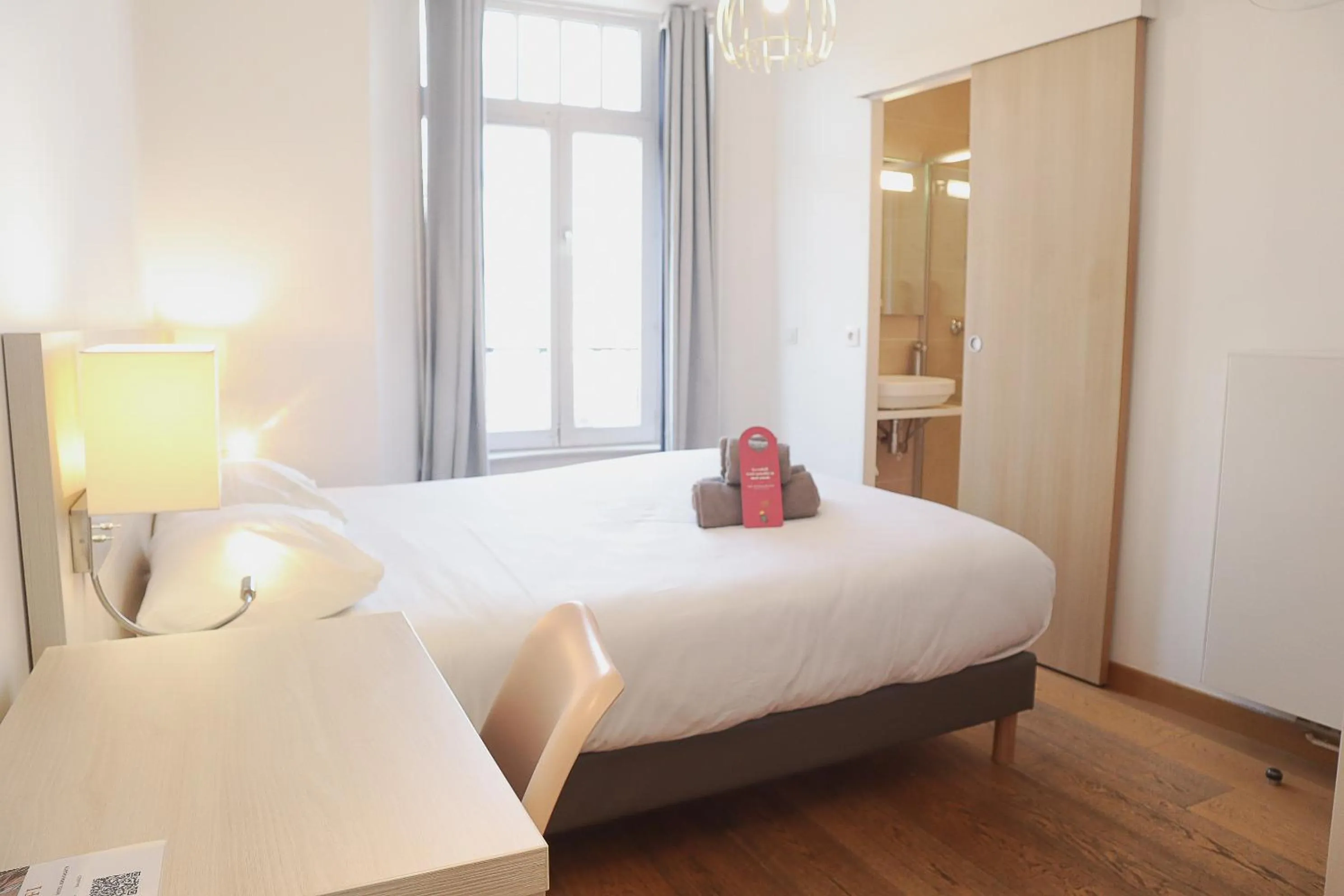 Photo of the whole room, Bed in HOTEL AMBASSADEUR