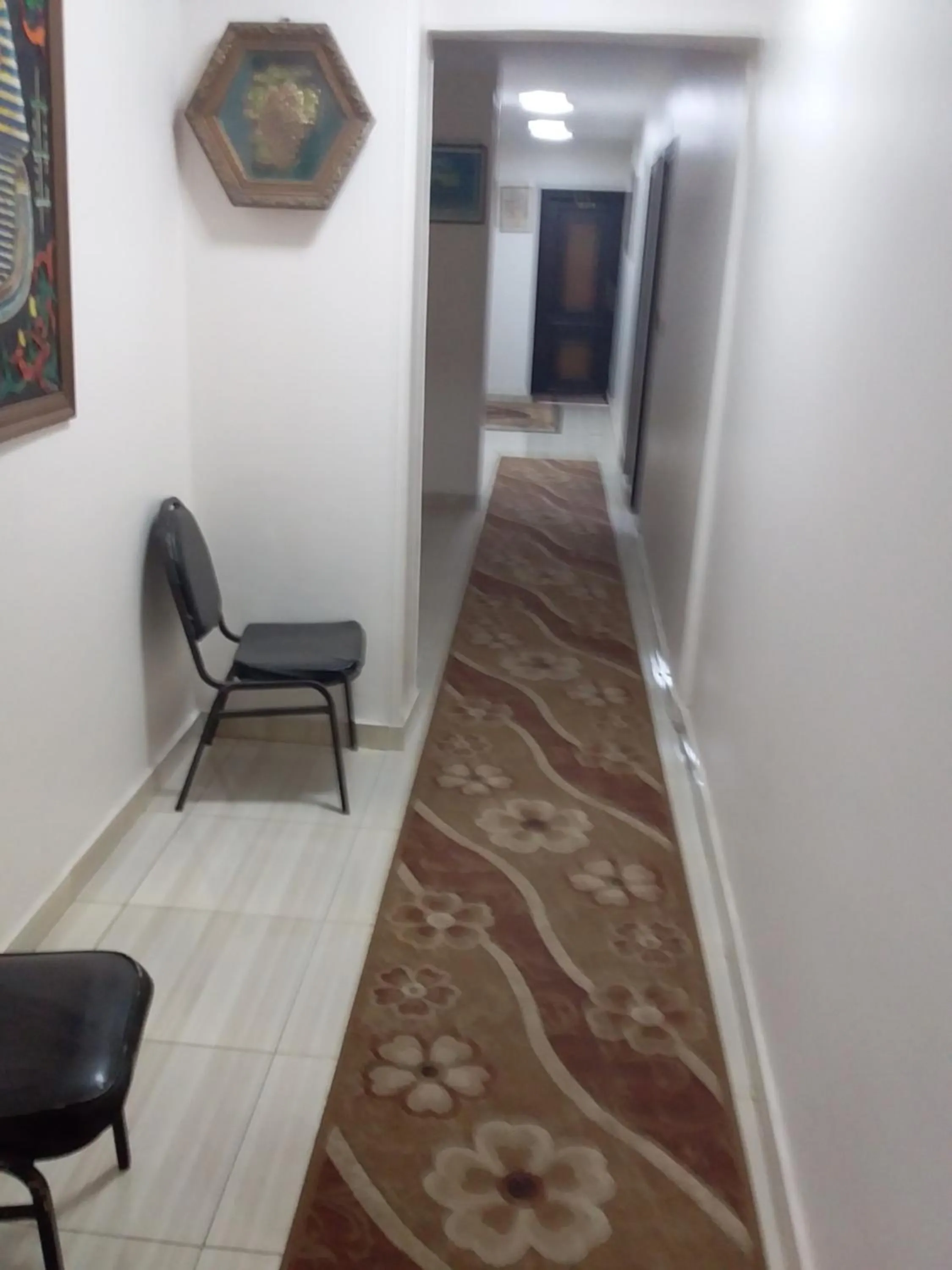 Communal lounge/ TV room in Isis Hostel 2