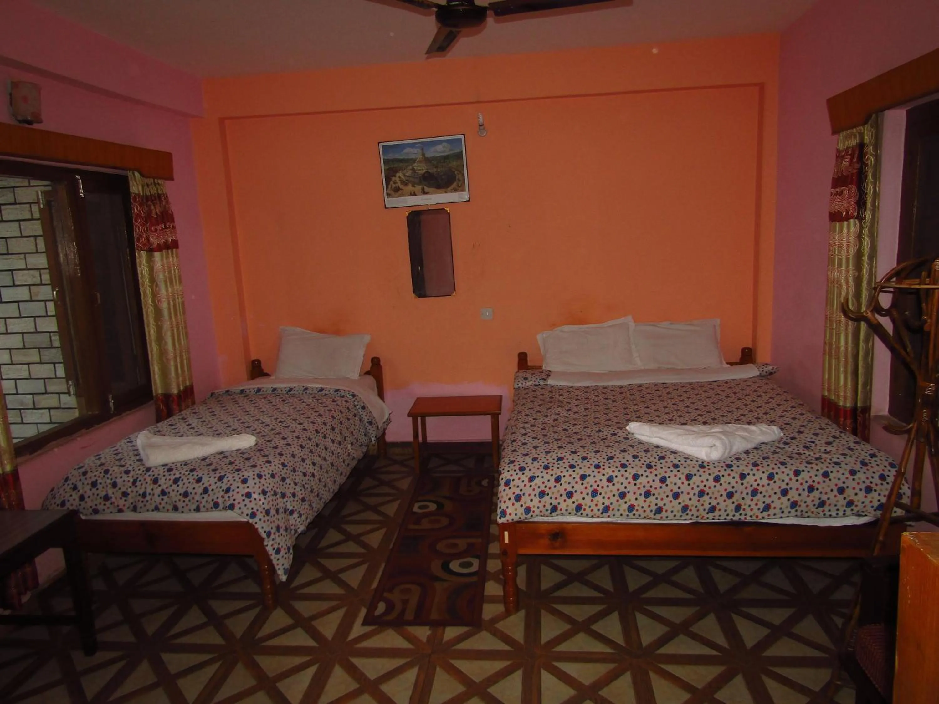 Bed in Hotel Lotus Inn