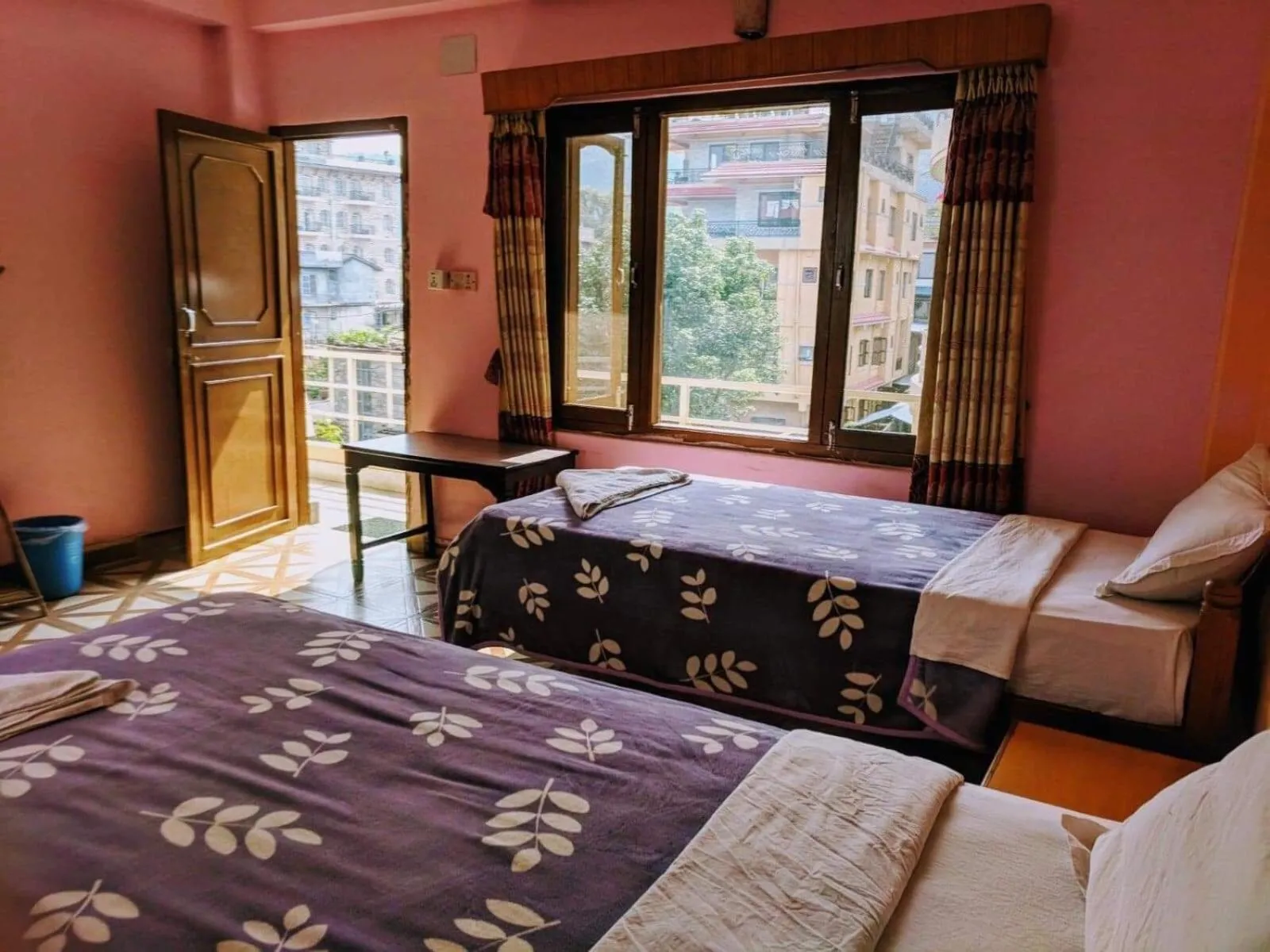Bed in Hotel Lotus Inn