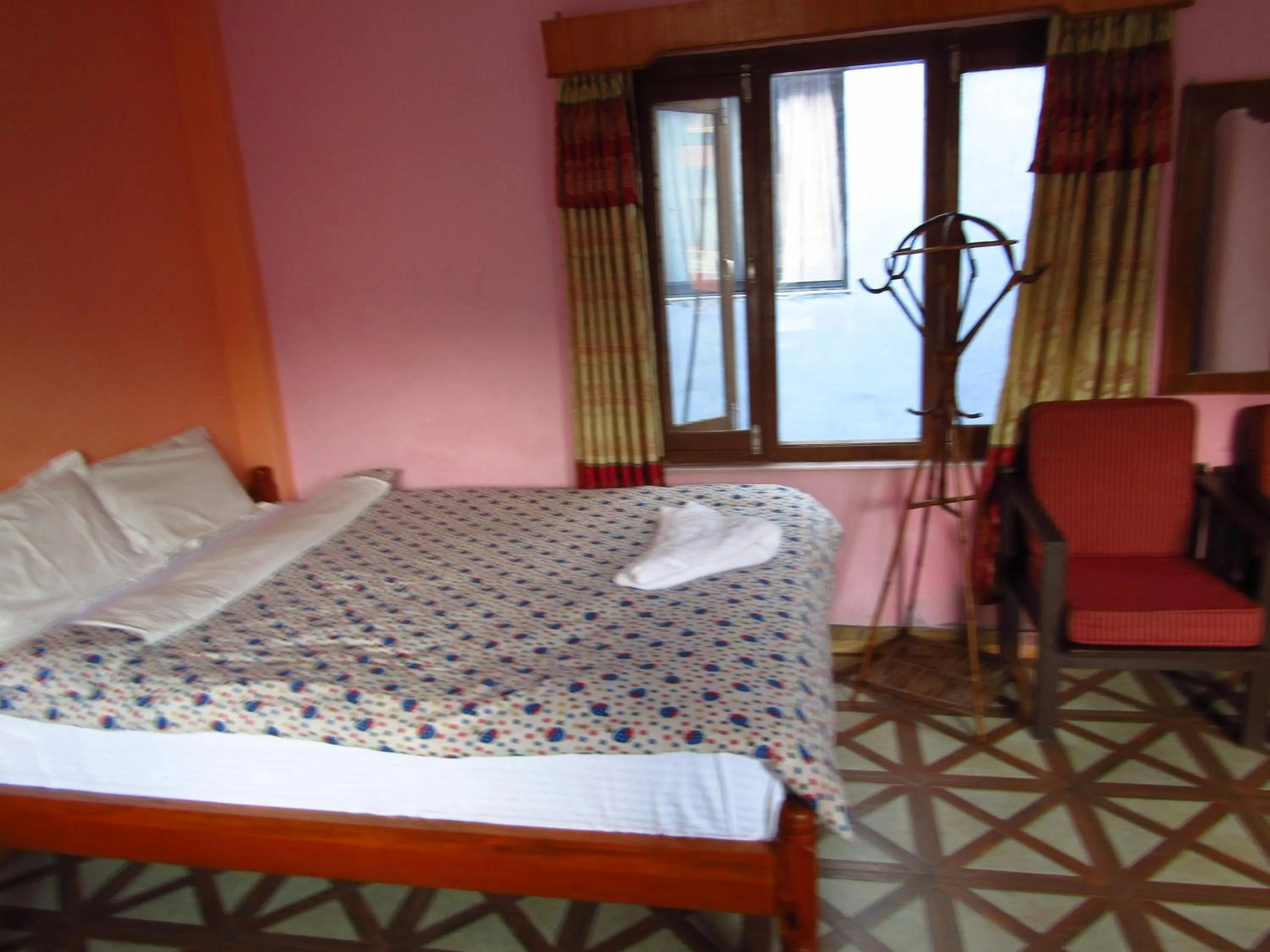 Bed in Hotel Lotus Inn