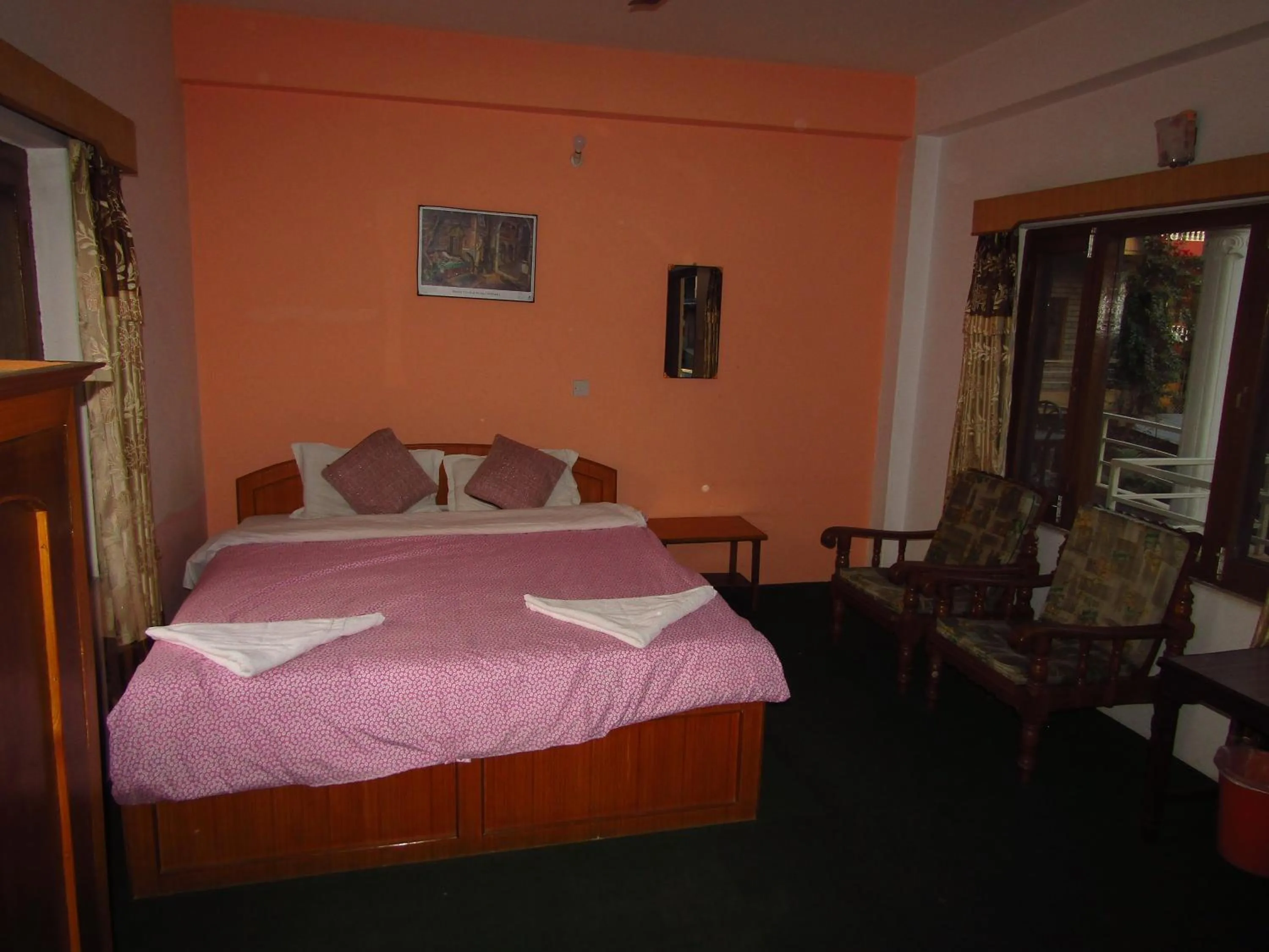Bed in Hotel Lotus Inn