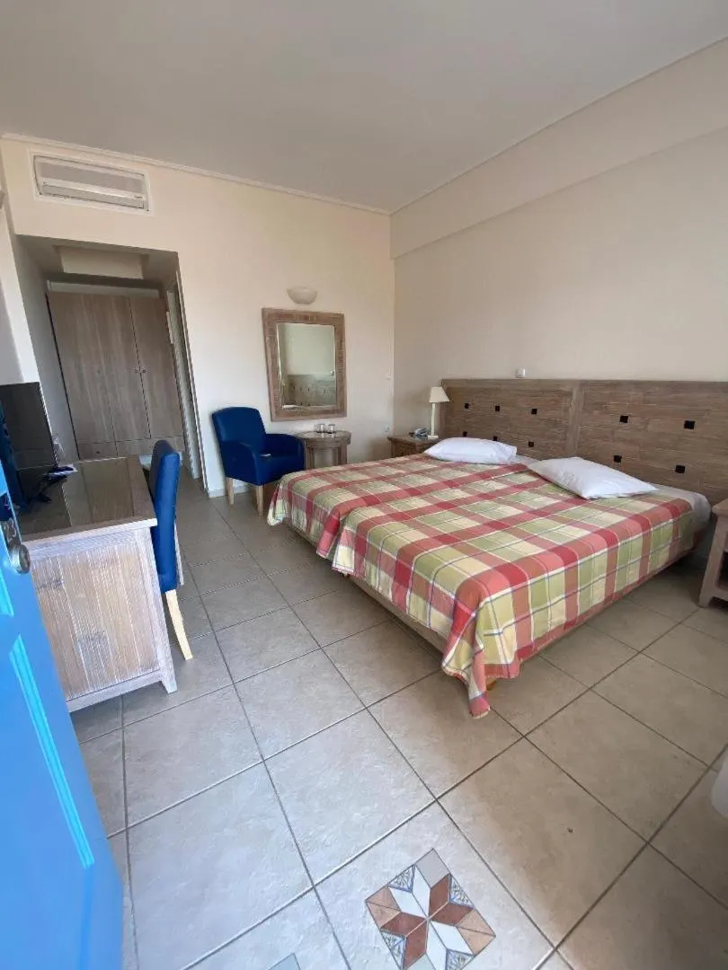 Bedroom, Bed in Alonissos Beach Bungalows And Suites Hotel