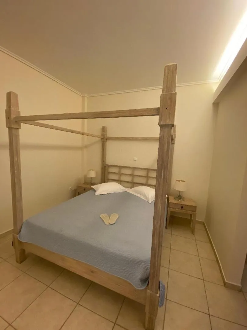 Bedroom, Bed in Alonissos Beach Bungalows And Suites Hotel