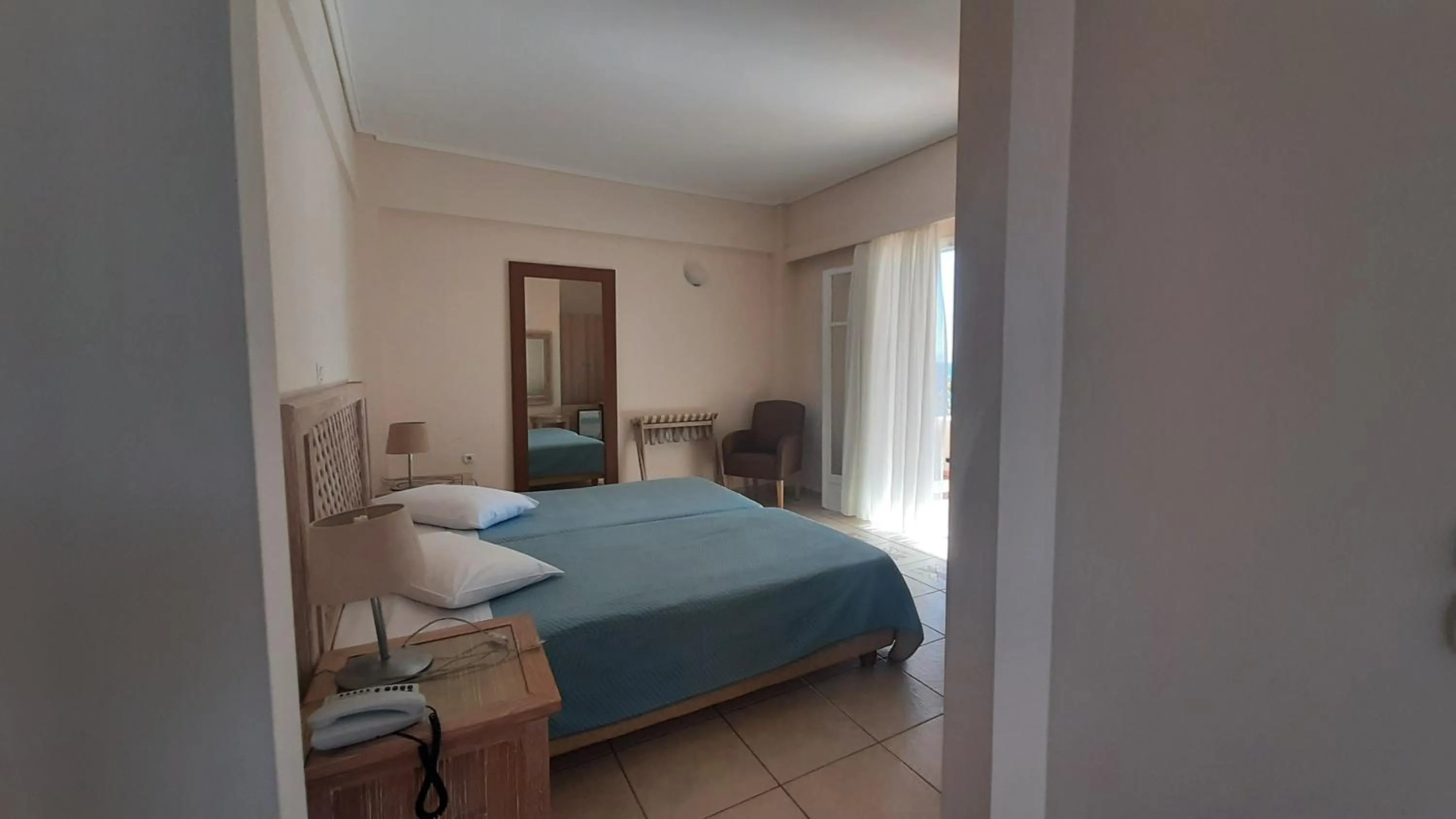 Bedroom, Bed in Alonissos Beach Bungalows And Suites Hotel