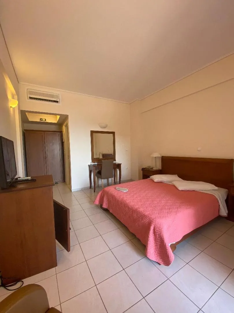 Bedroom, Bed in Alonissos Beach Bungalows And Suites Hotel