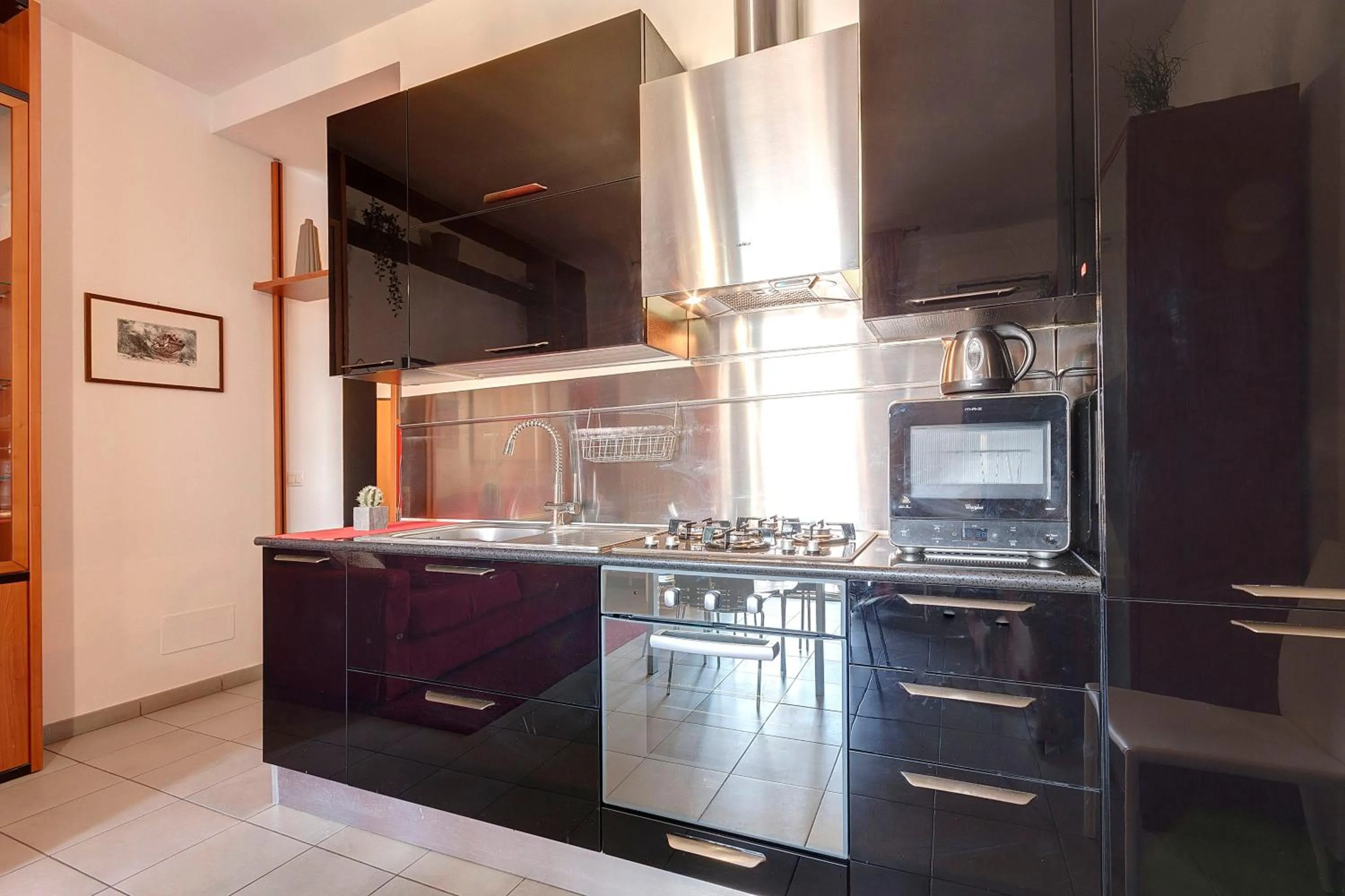 Kitchen or kitchenette in Binario9 Terrace Apartment by Mamo Florence