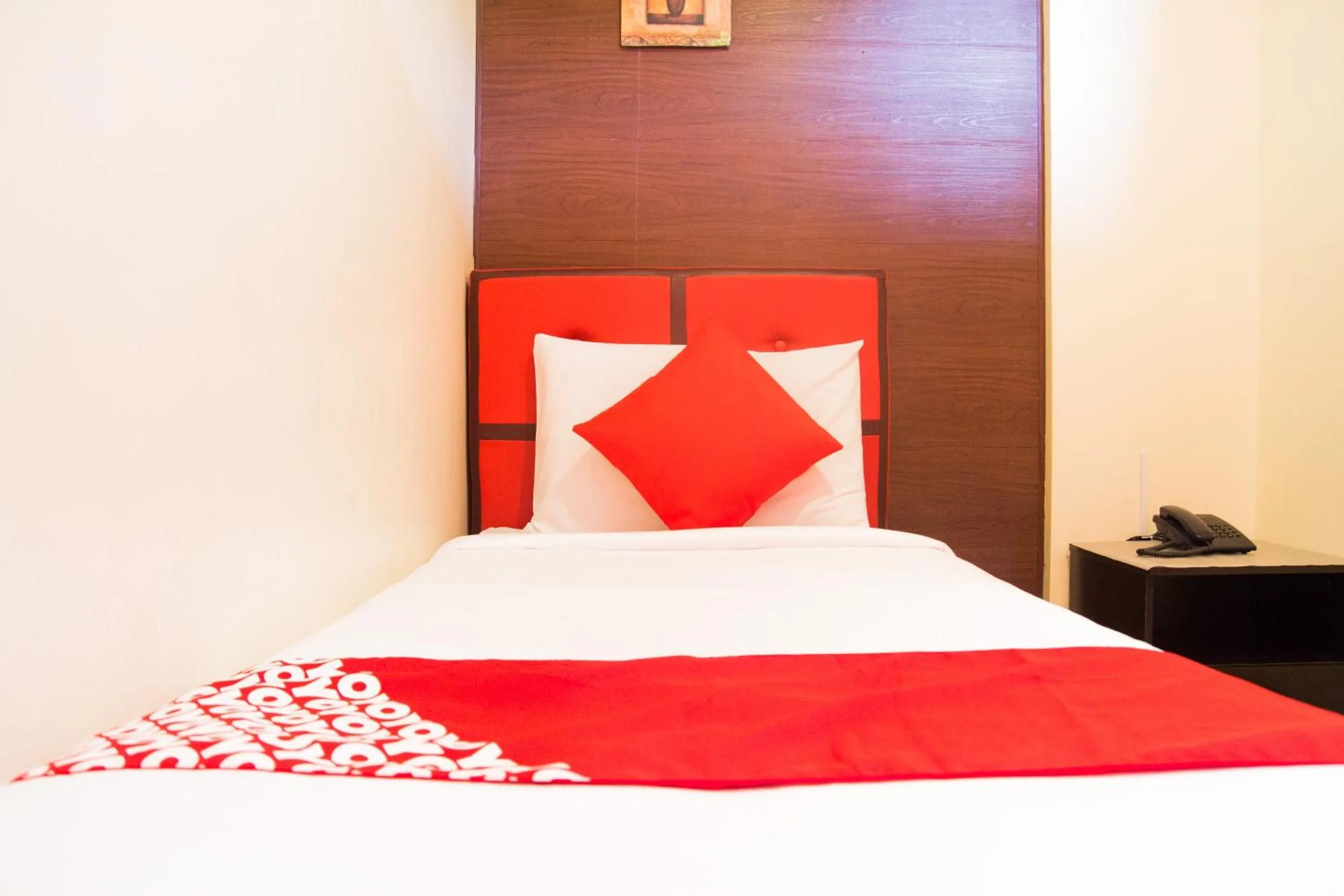 Bedroom in OYO 153 Espacio de Clarita Hometel