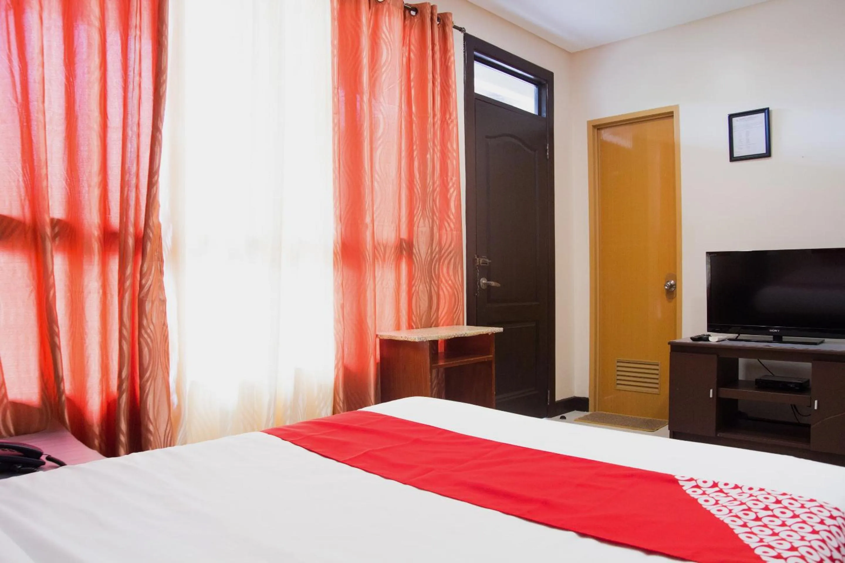 Bedroom in OYO 153 Espacio de Clarita Hometel