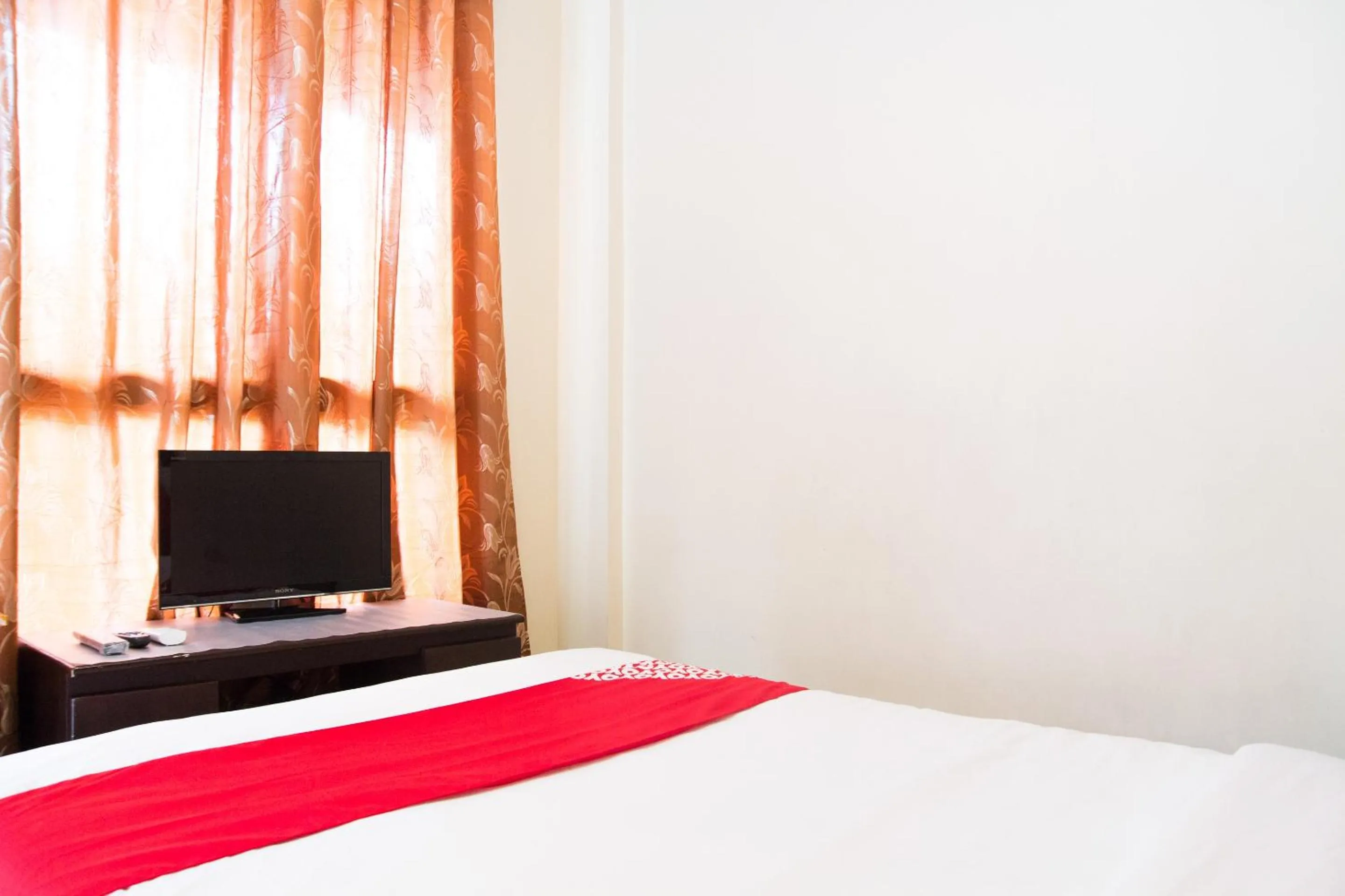 Bedroom in OYO 153 Espacio de Clarita Hometel