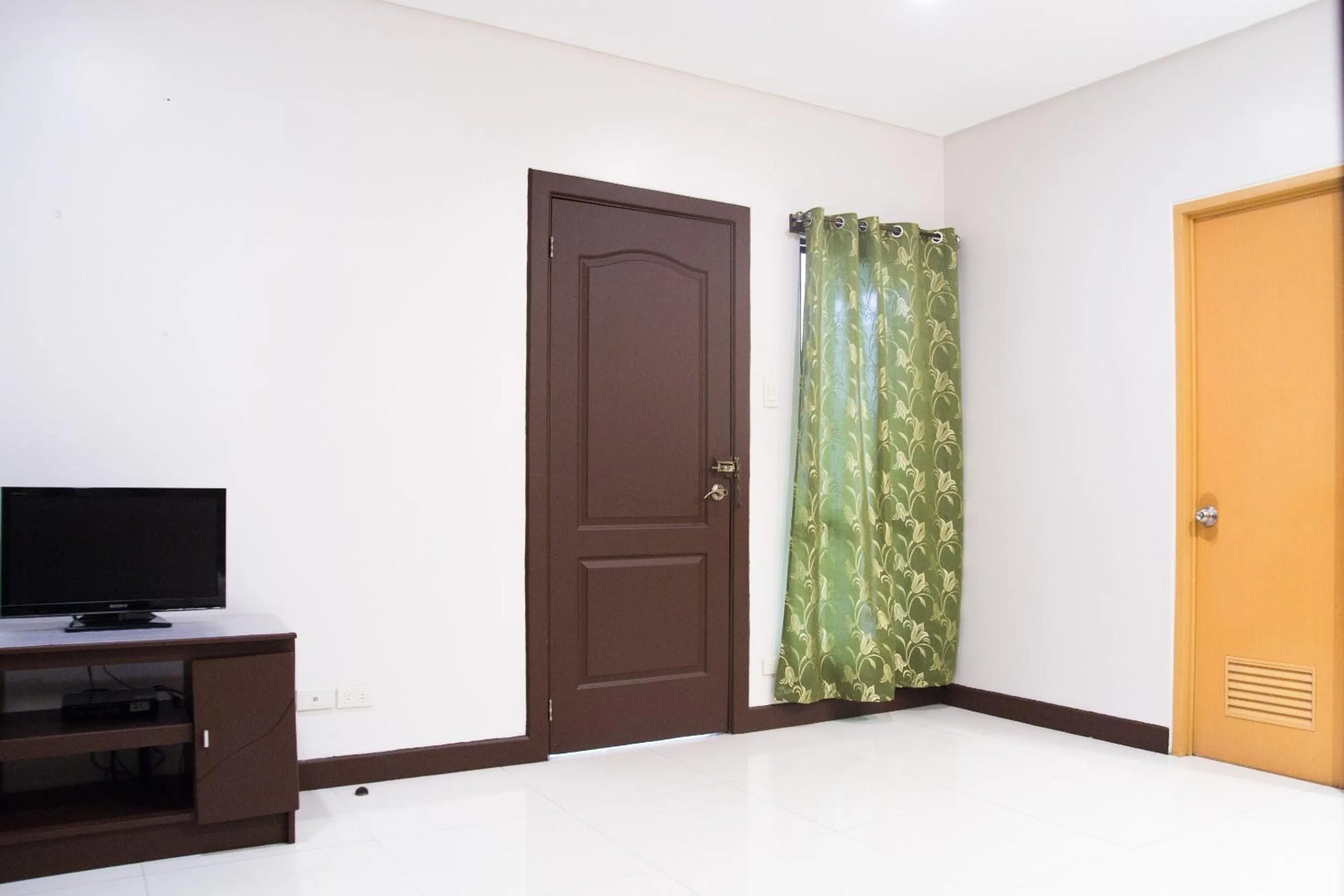 Bedroom in OYO 153 Espacio de Clarita Hometel