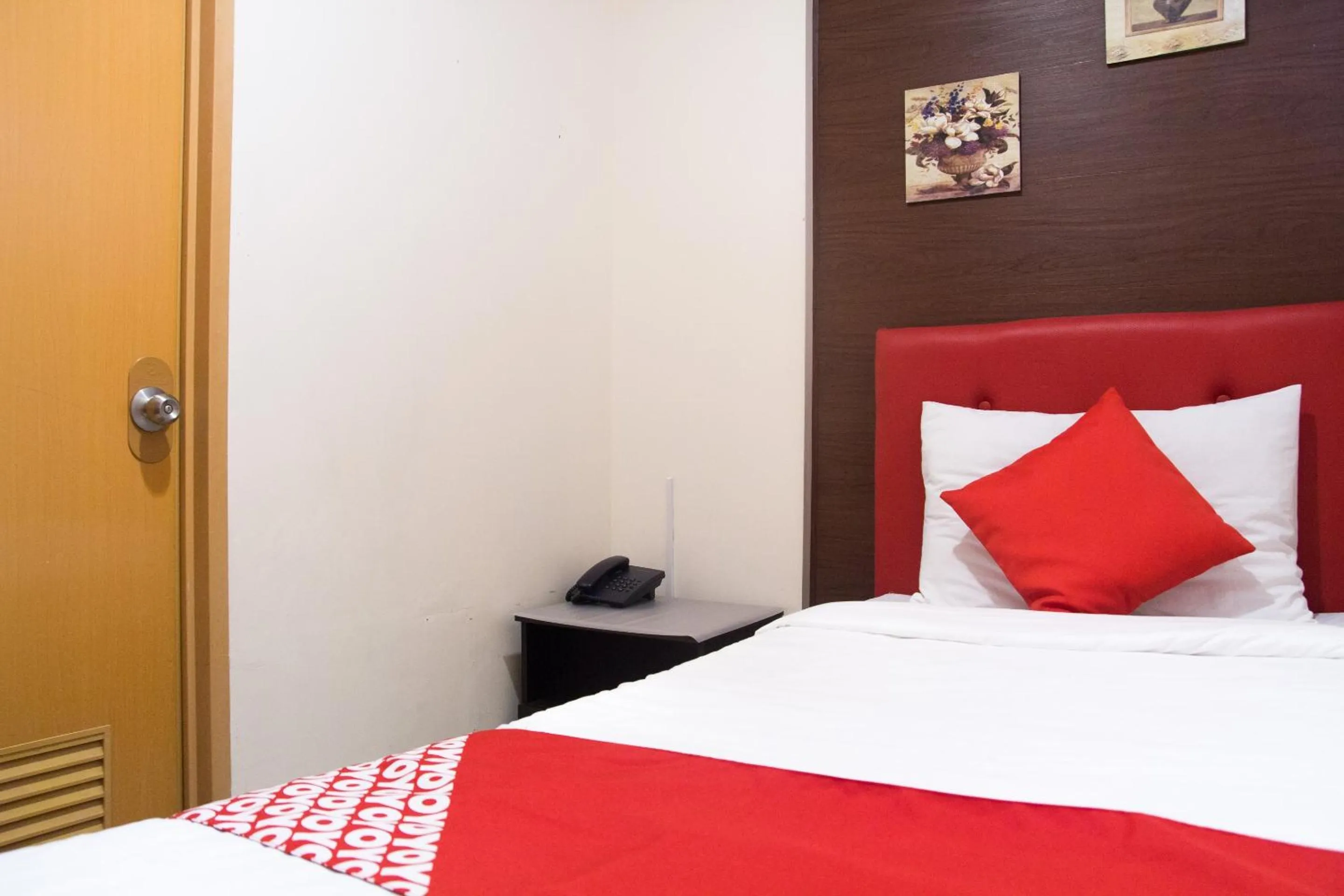 Bedroom in OYO 153 Espacio de Clarita Hometel