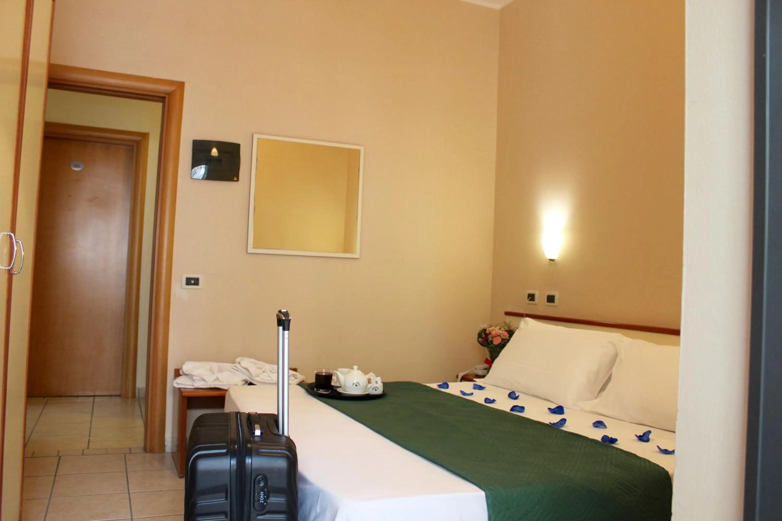 Photo of the whole room, Bed in Blue Hotel