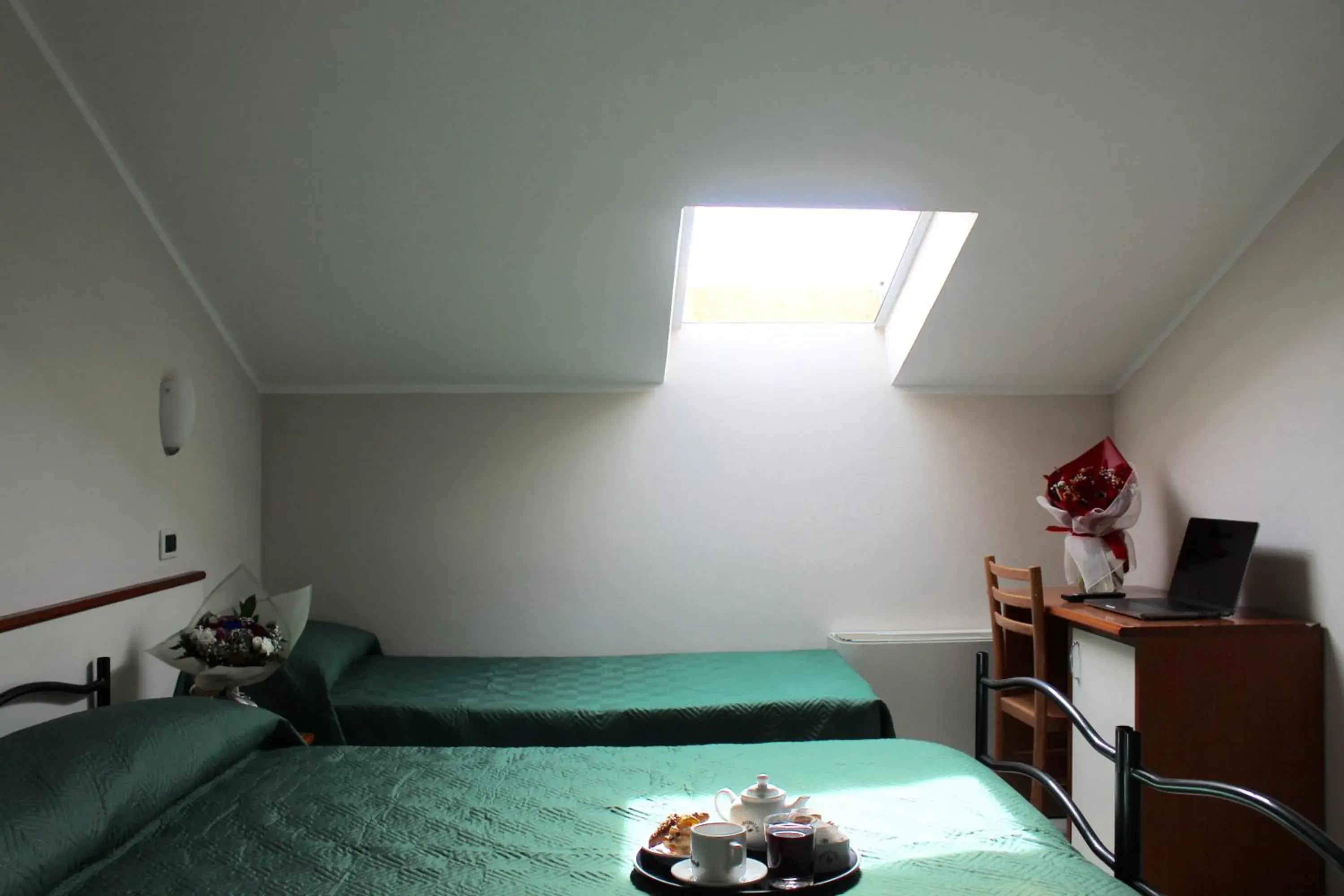 Economy Triple Room in Blue Hotel Economy Triple Room in Blue Hotel