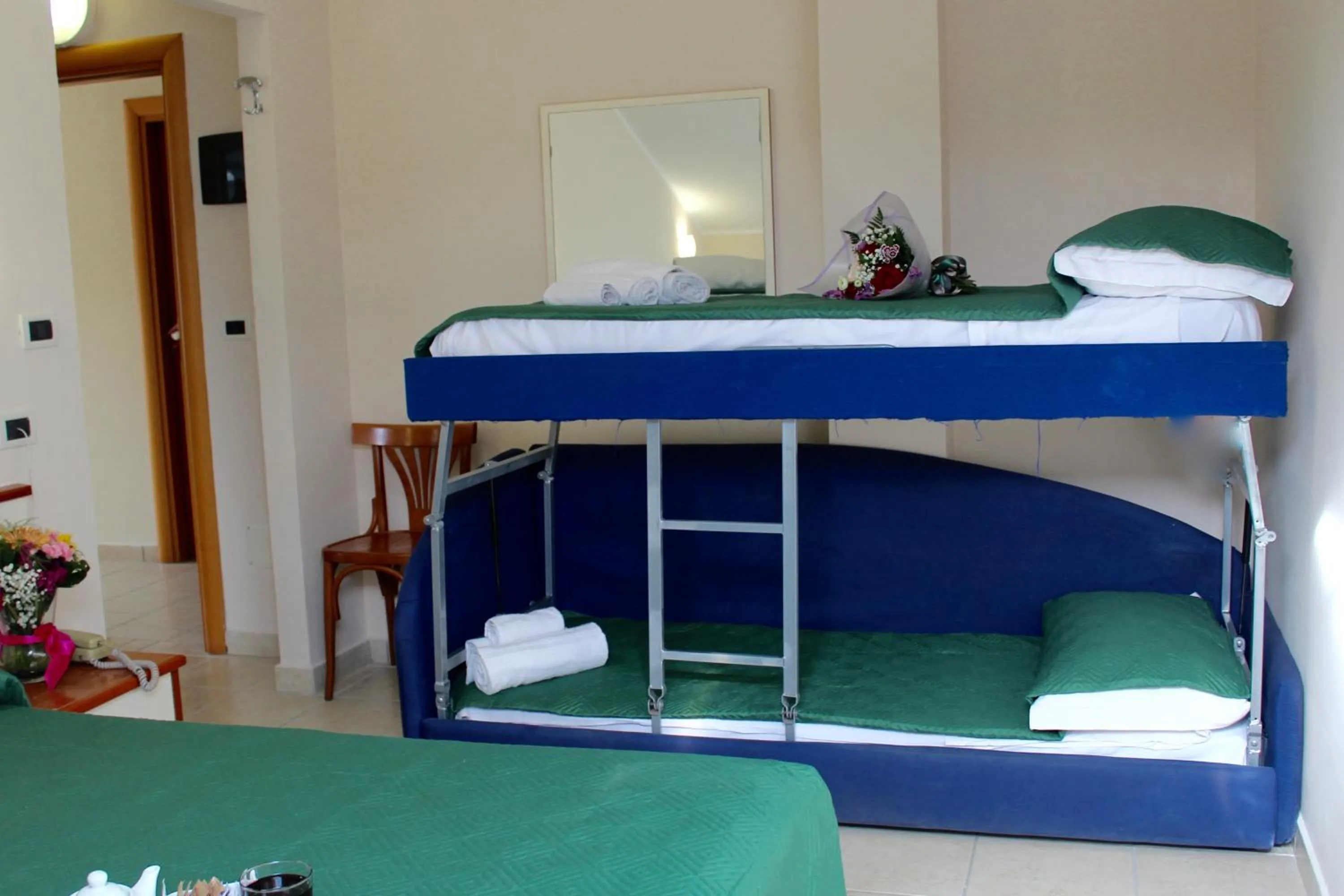 Photo of the whole room, Bed in Blue Hotel