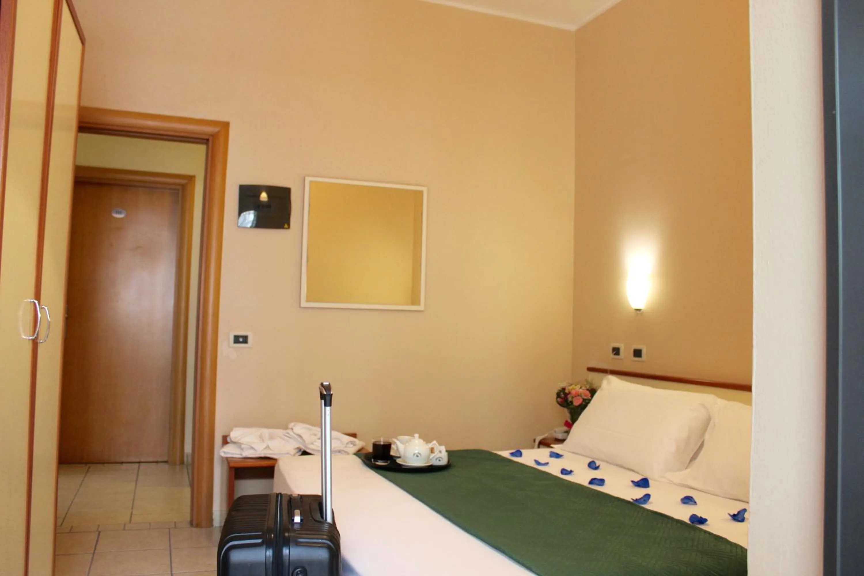 Photo of the whole room, Bed in Blue Hotel