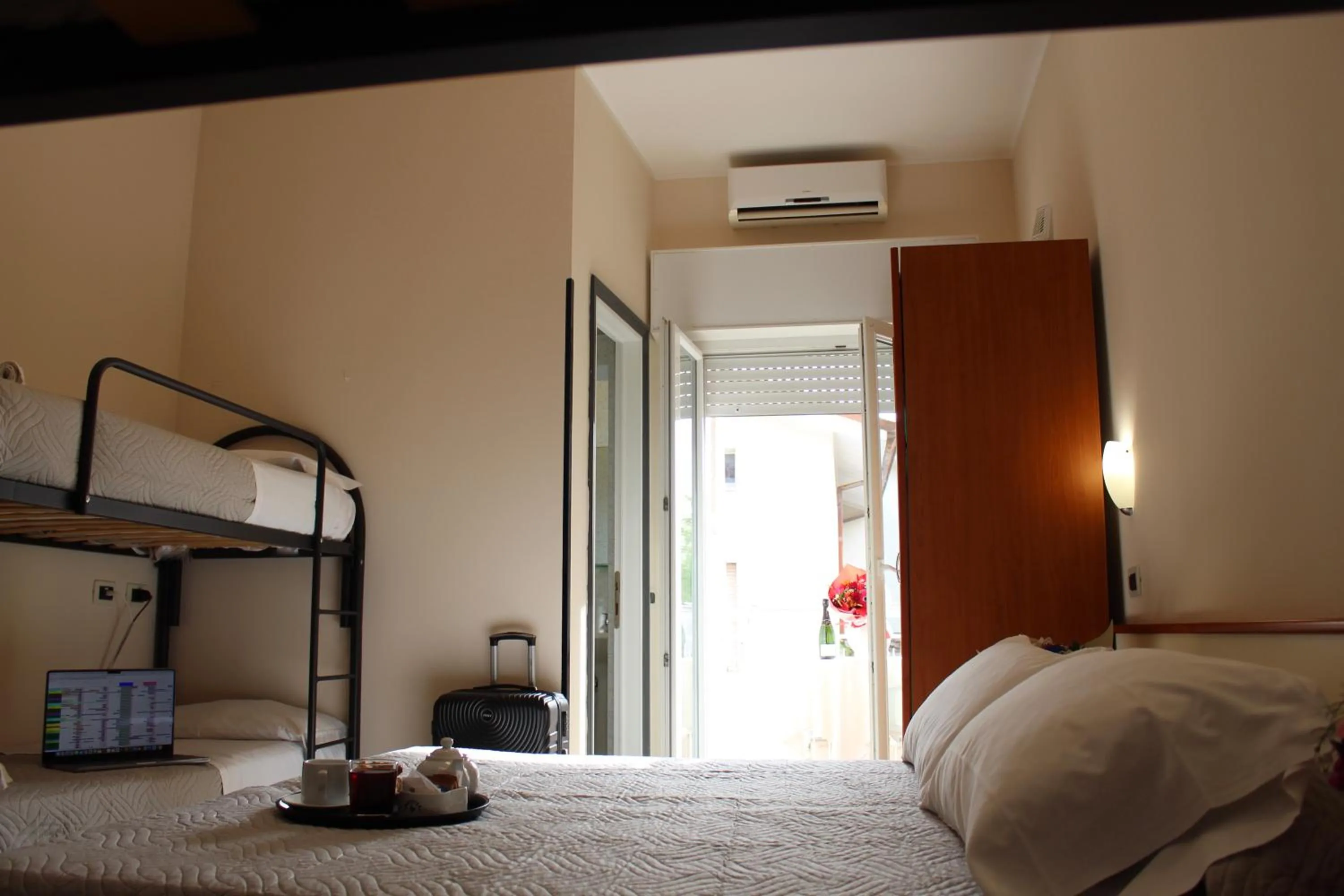 Photo of the whole room, Bed in Blue Hotel