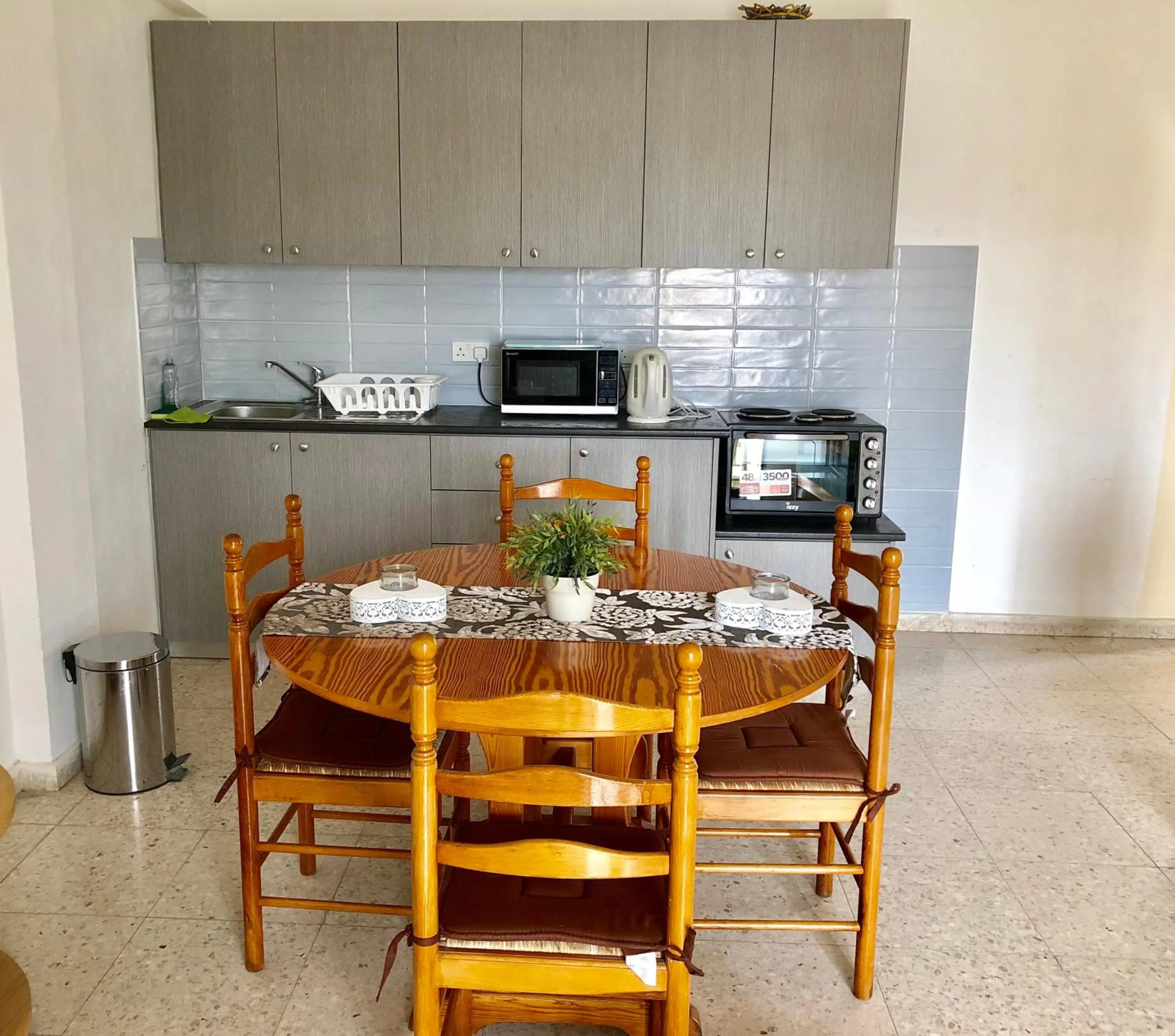 Kitchen or kitchenette in Angela Holiday Apartments