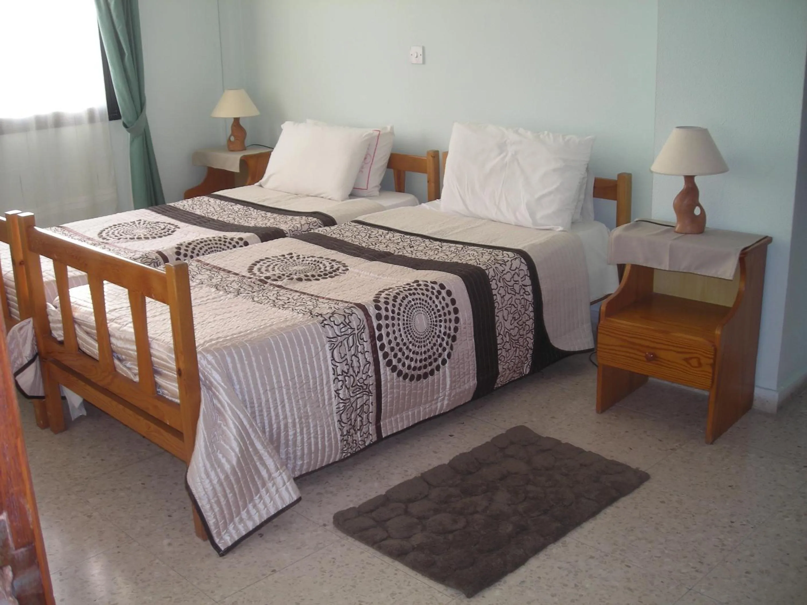 Bed in Angela Holiday Apartments