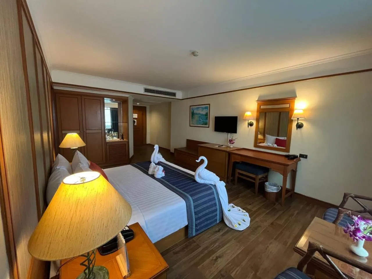 Bed in Cholchan Pattaya Beach Resort - SHA Extra Plus