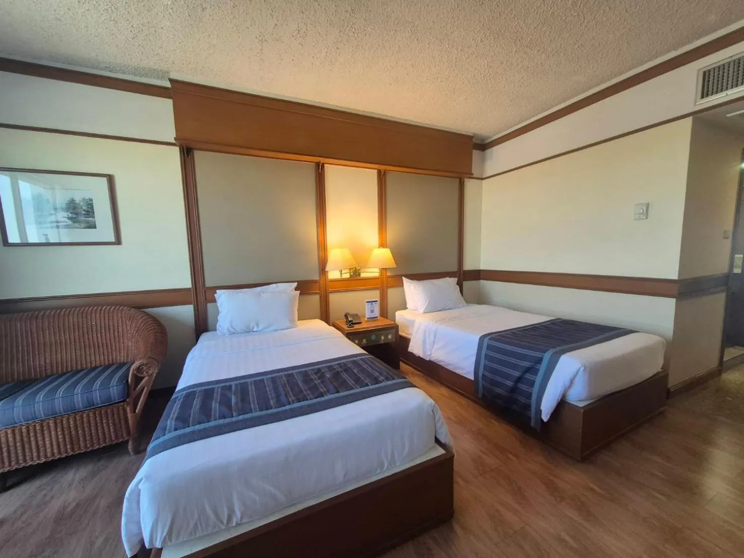 Bed in Cholchan Pattaya Beach Resort - SHA Extra Plus