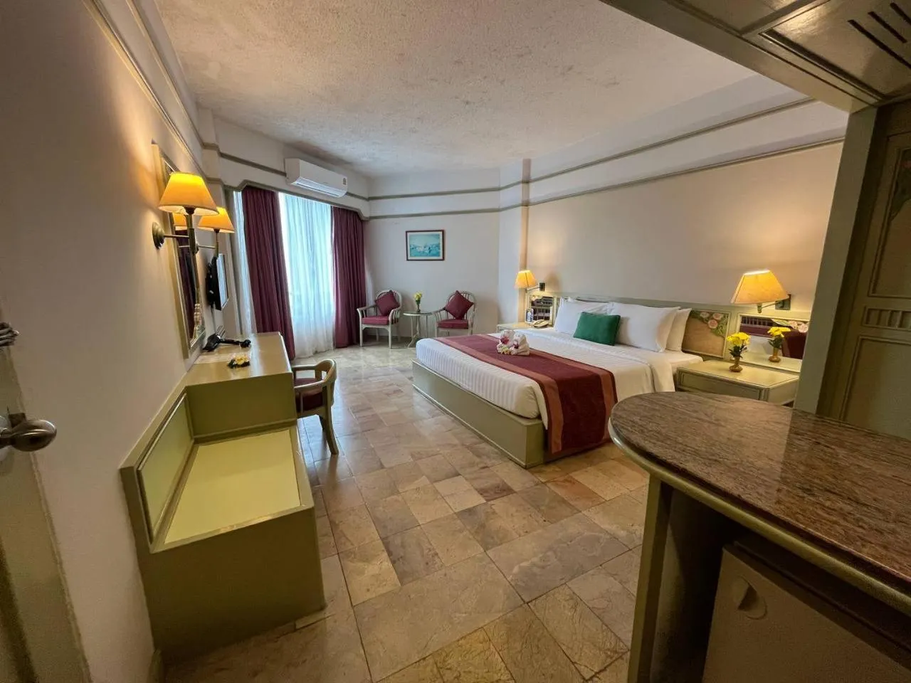 Bed in Cholchan Pattaya Beach Resort - SHA Extra Plus