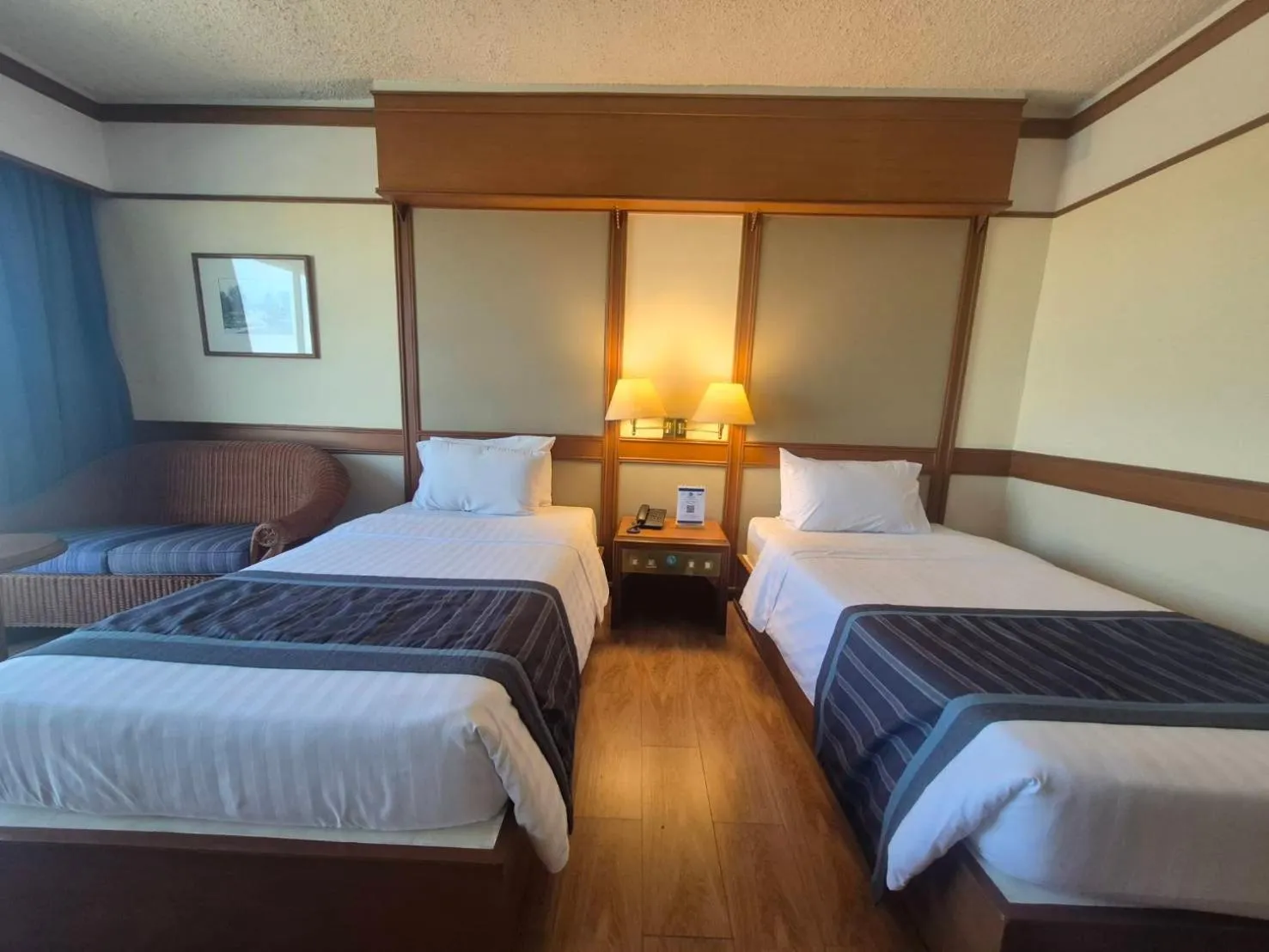 Bed in Cholchan Pattaya Beach Resort - SHA Extra Plus