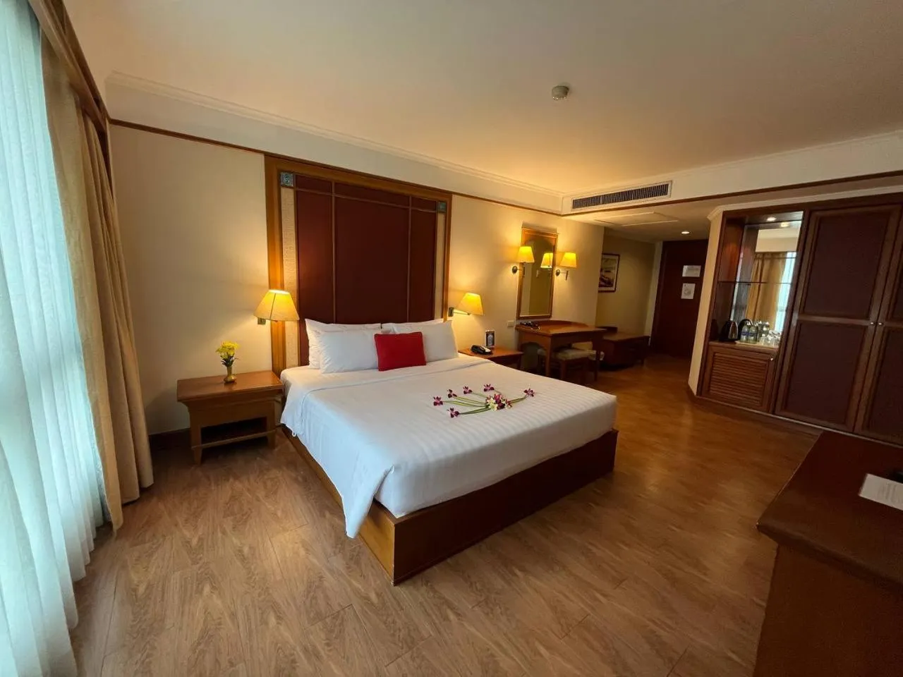 Bed in Cholchan Pattaya Beach Resort - SHA Extra Plus