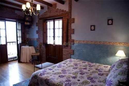Photo of the whole room, Bed in Hotel "Posada Finca EL SOLAR" Algunas habts tipo estudio con nevera microondas hidromasaje para 2 terraza vistas - " Gintonic- Bar -Terraza panorámica"