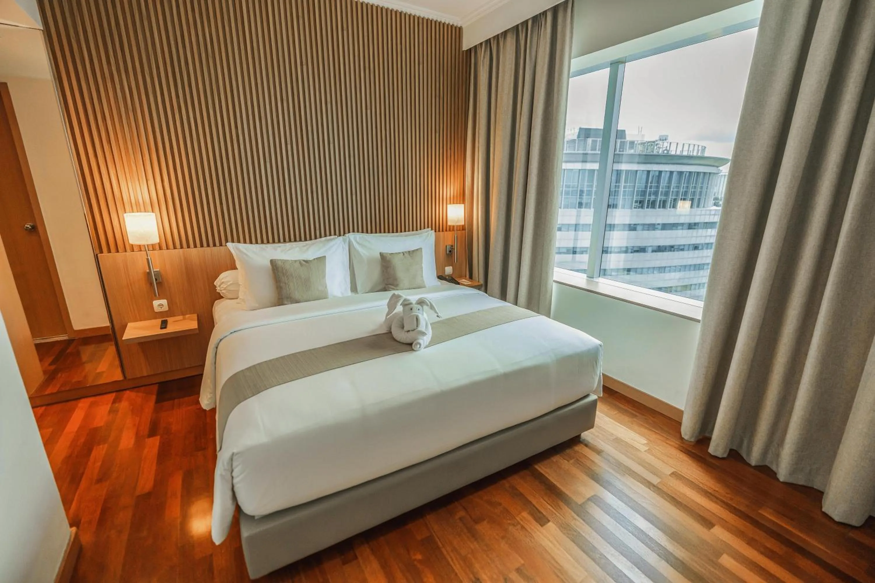 Bed in Hotel KIMAYA Slipi Jakarta By HARRIS