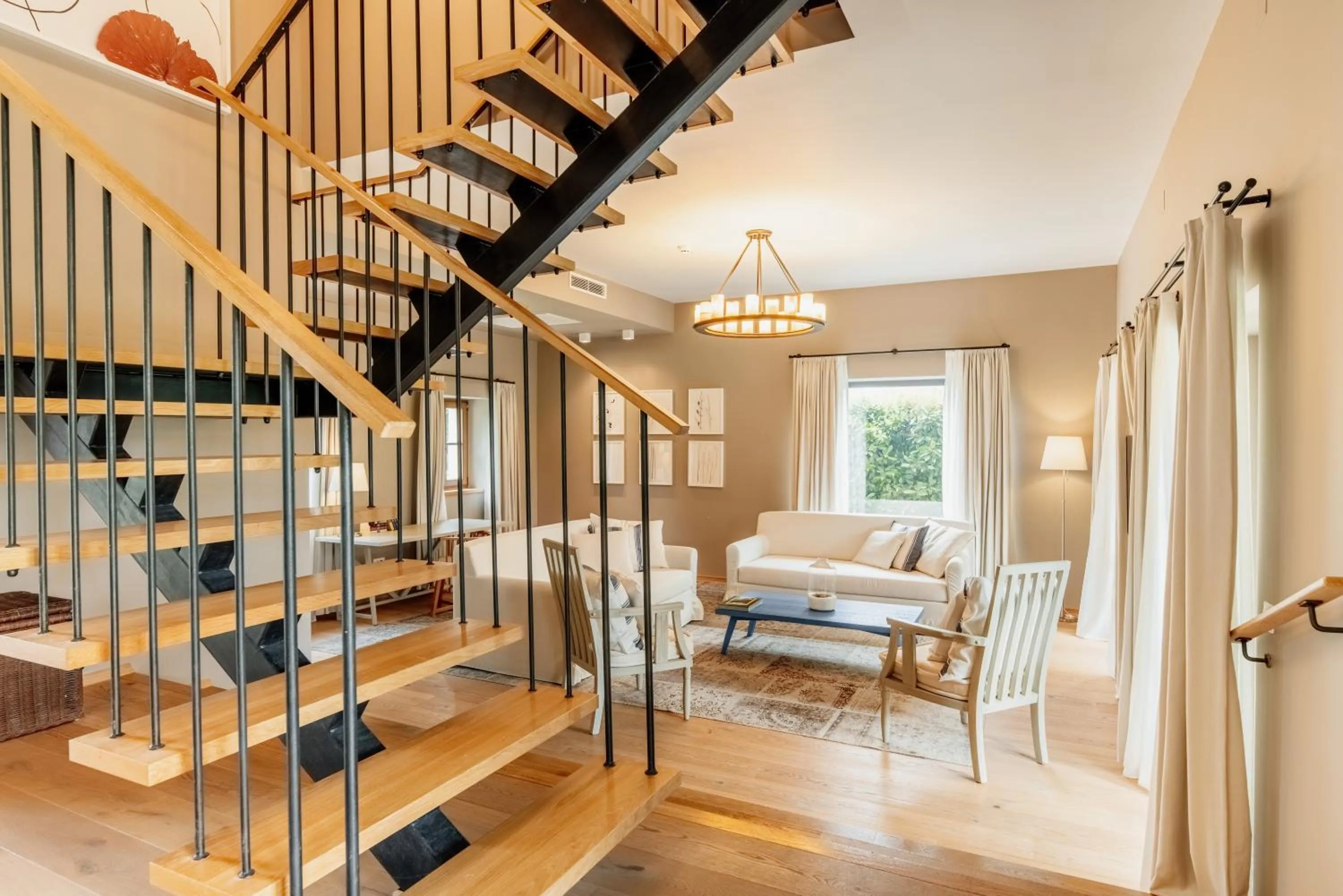 Living room, Bed in Meneghetti Wine Hotel and Winery - Relais & Chateaux