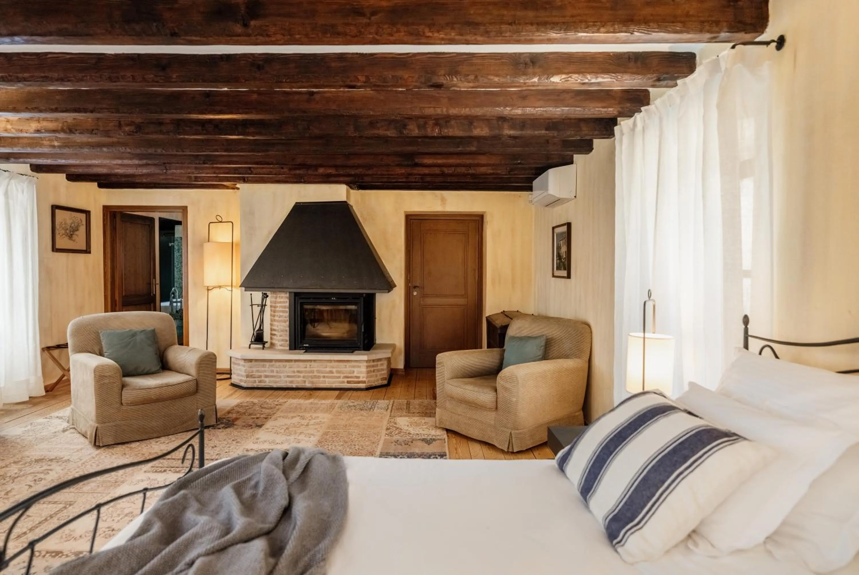 Bedroom in Meneghetti Wine Hotel and Winery - Relais & Chateaux