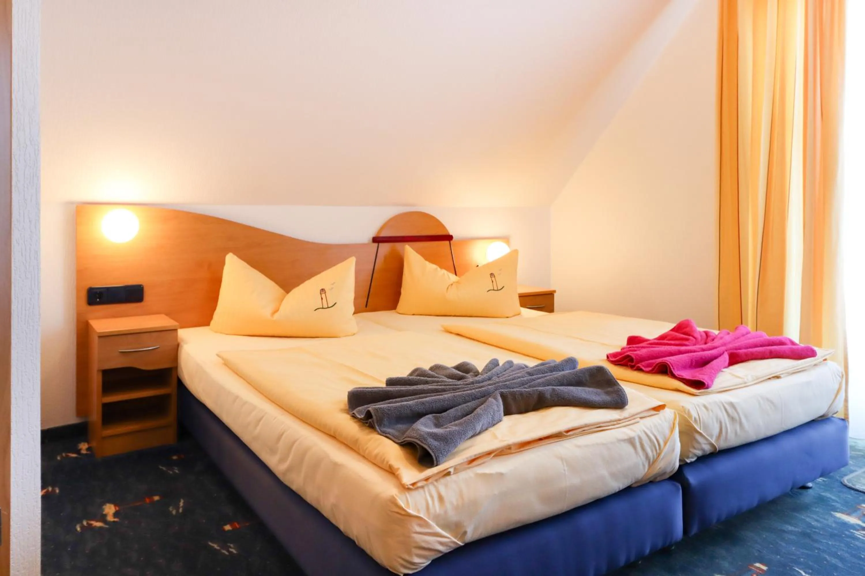 Bed in Aparthotel Leuchtfeuer Rügen