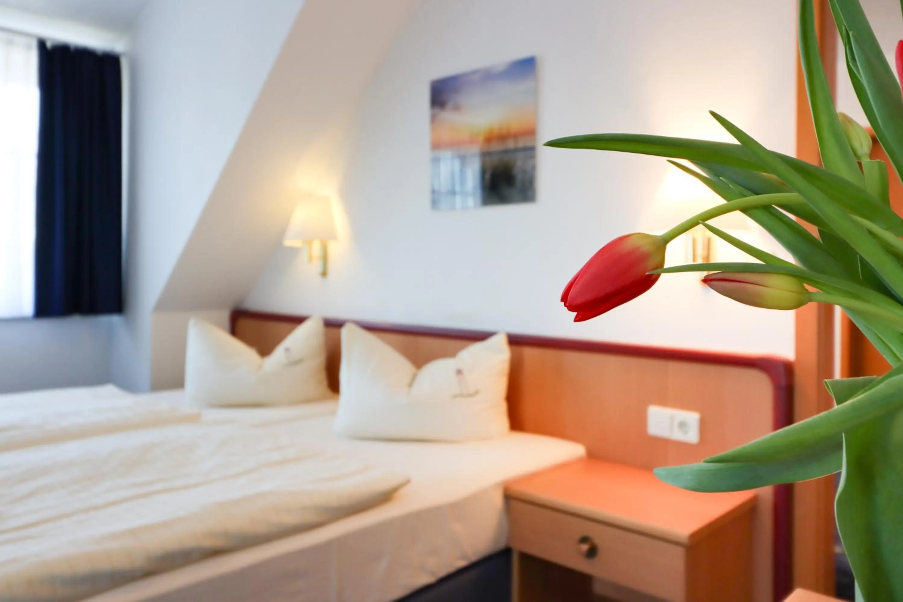 Bed in Aparthotel Leuchtfeuer Rügen