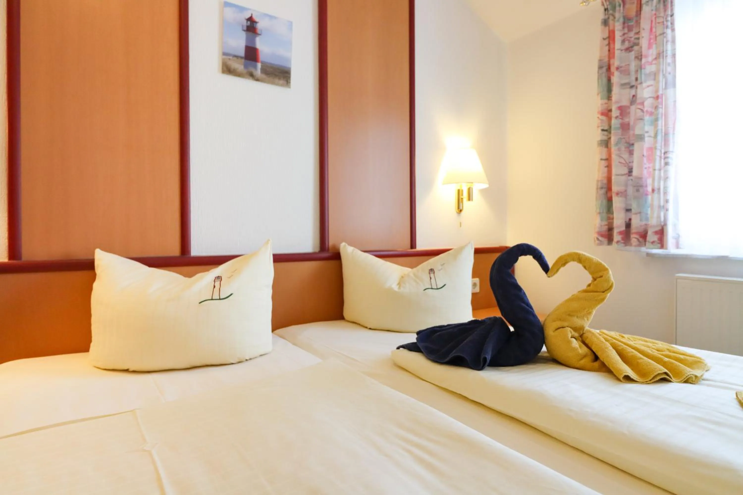 Bed in Aparthotel Leuchtfeuer Rügen