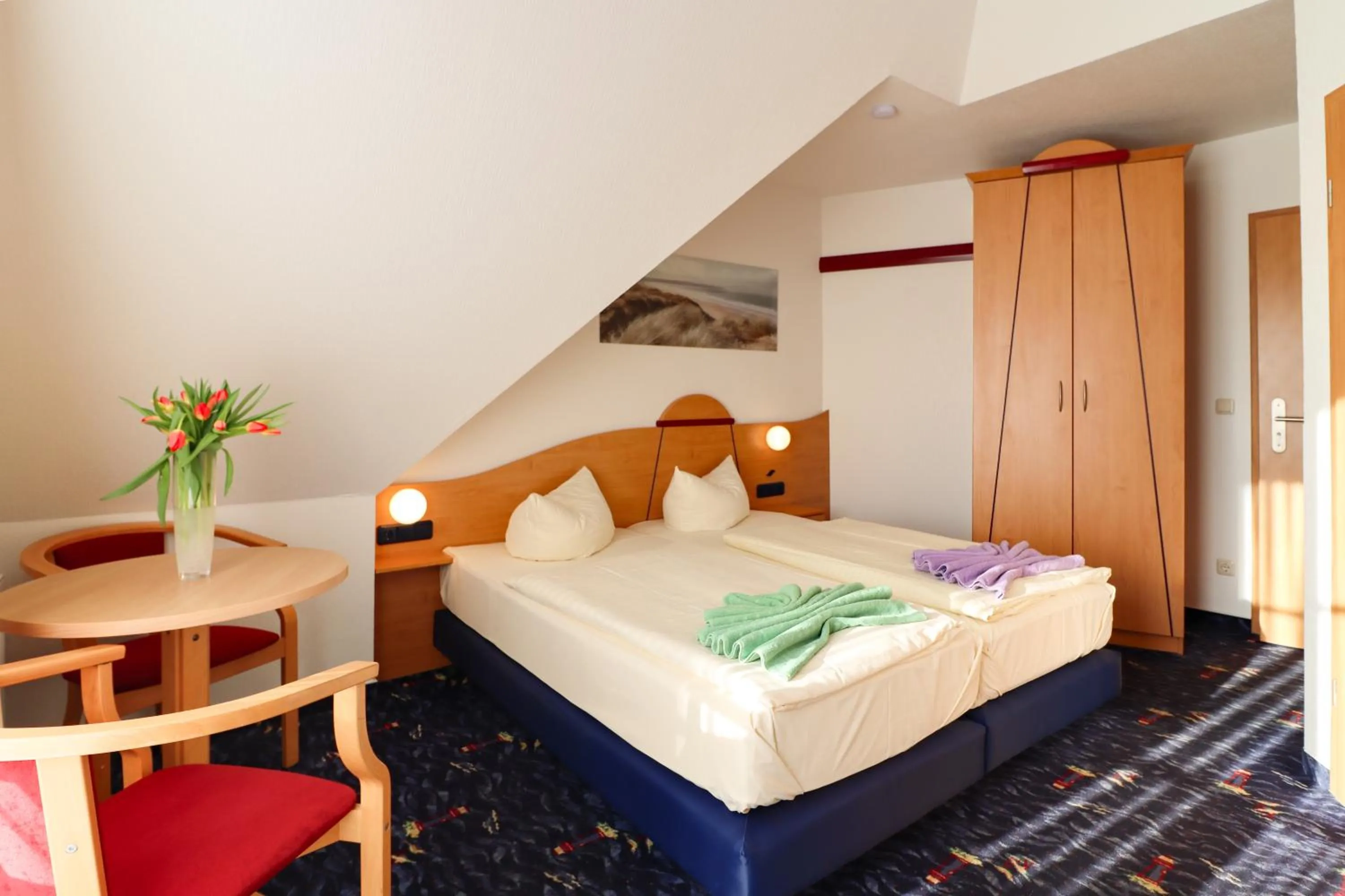 Bed in Aparthotel Leuchtfeuer Rügen