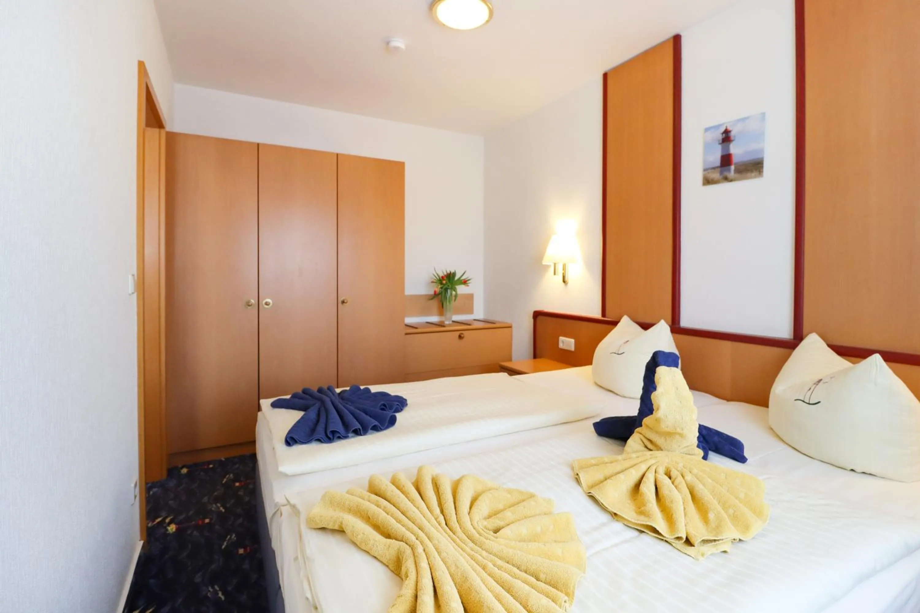 Bed in Aparthotel Leuchtfeuer Rügen