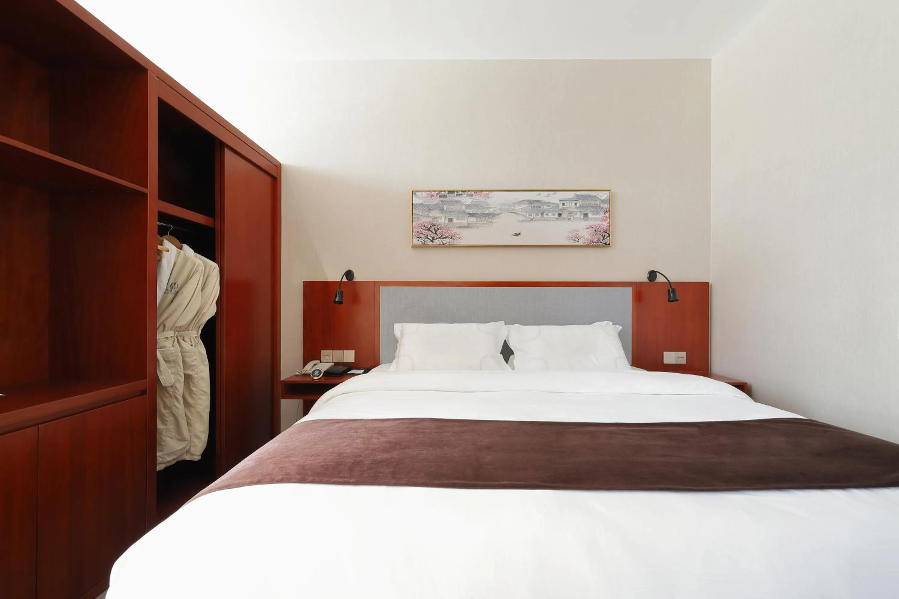 Bed in Mengguo Hotel Pudong Airport