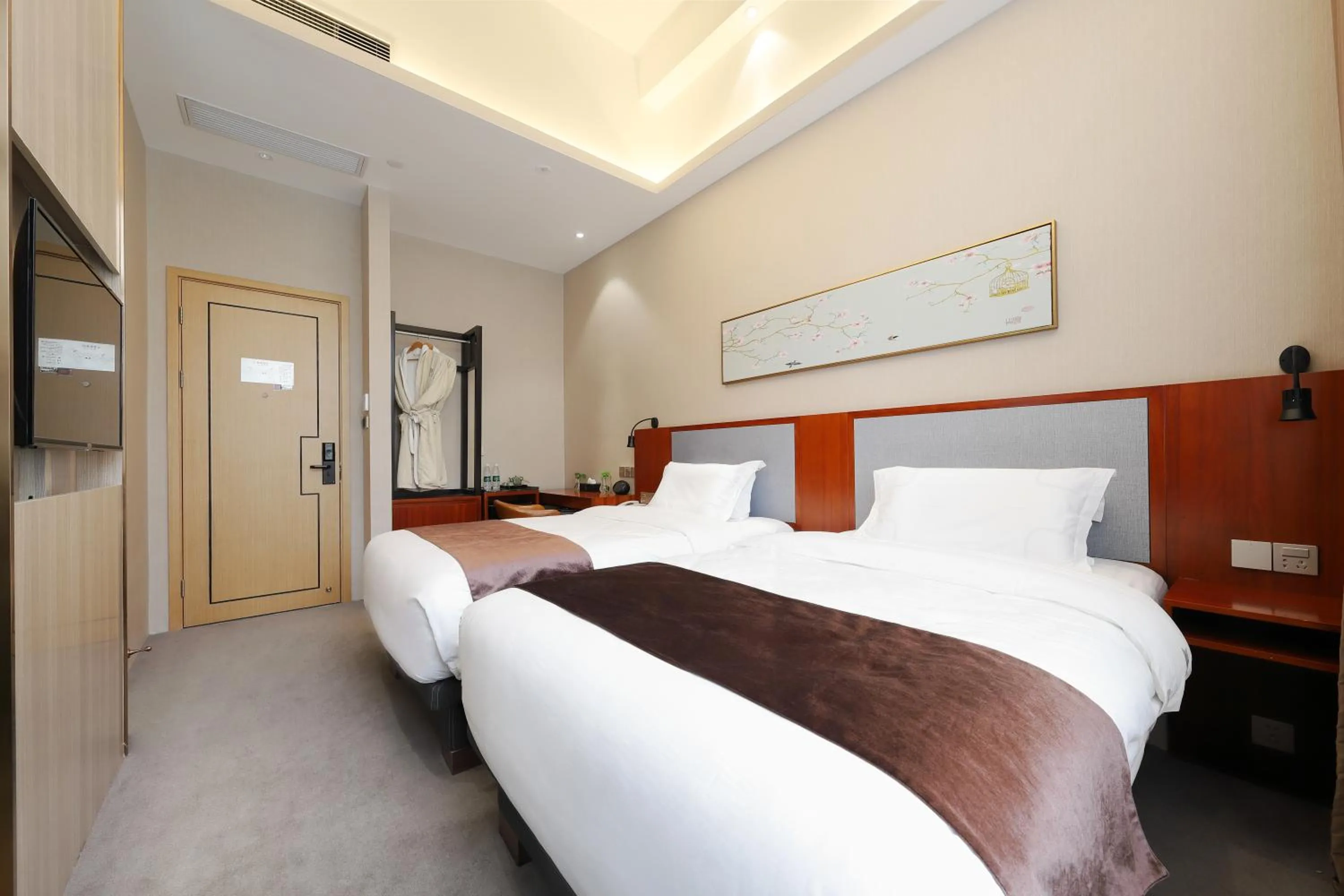 Bed in Mengguo Hotel Pudong Airport