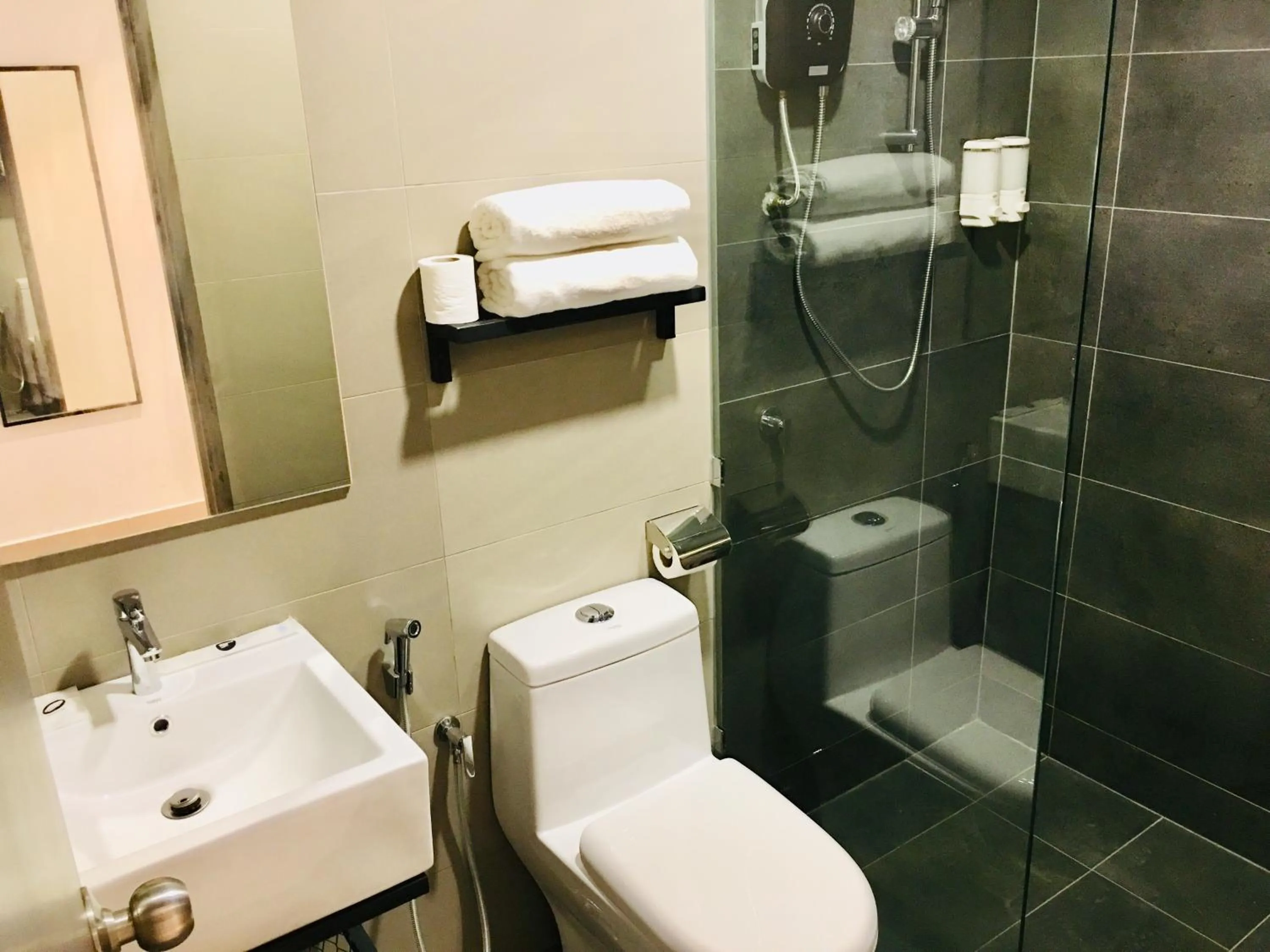 Shower in Enclave Business Hotel
