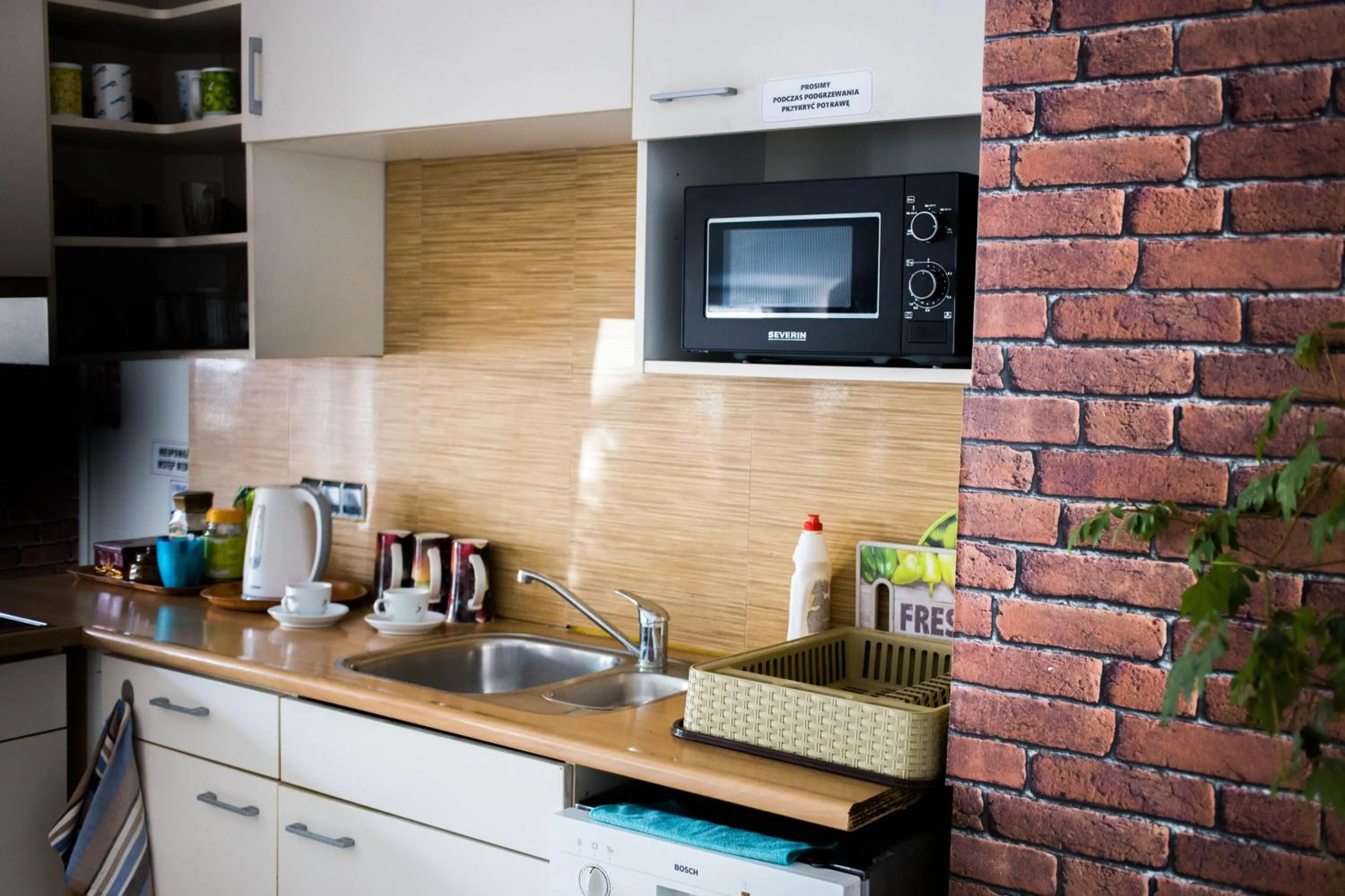 Communal kitchen in Hotelik Okęcie 39 - Nocleg i Parking Blisko Lotnisko Okęcie
